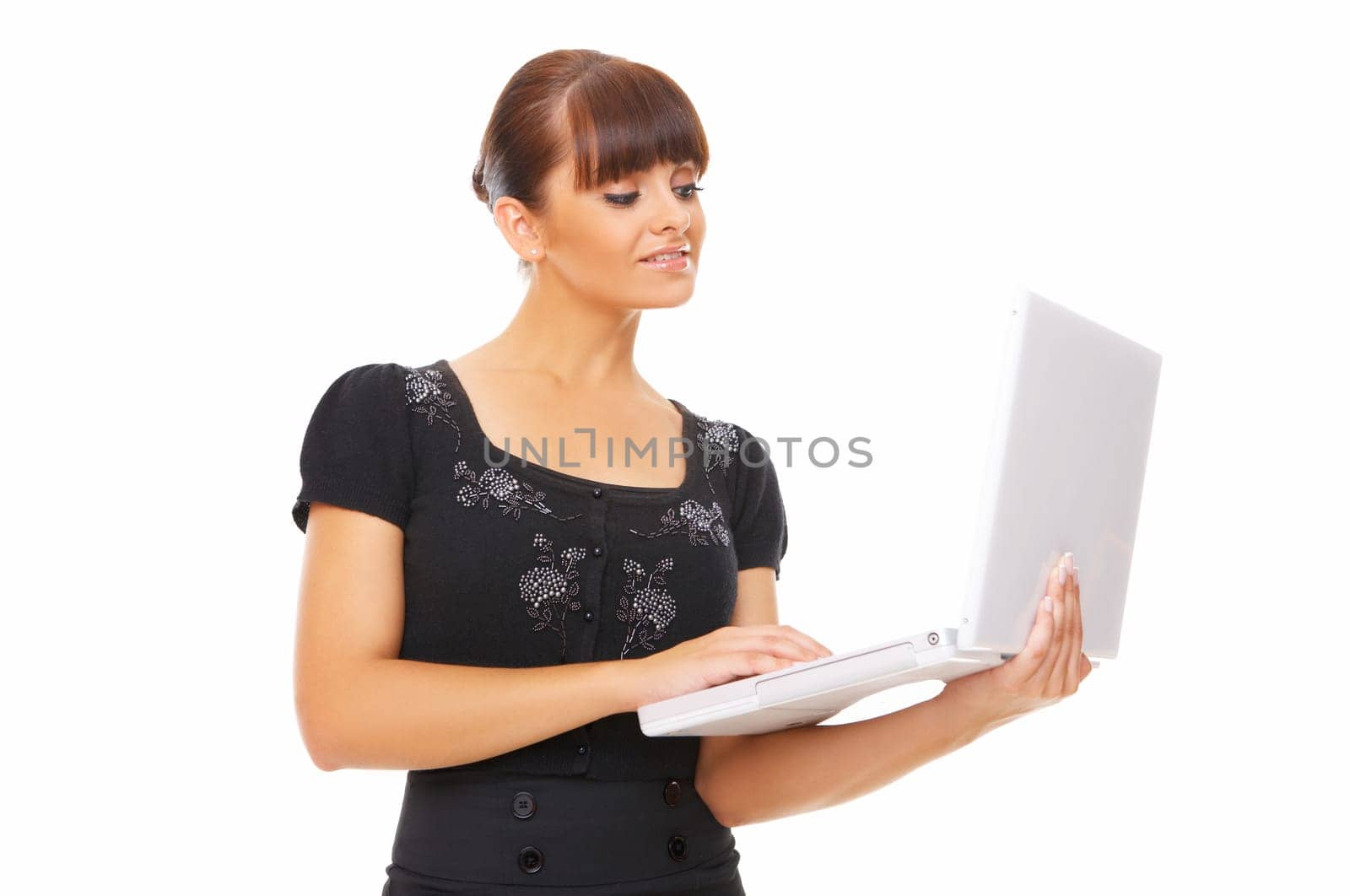 Portrait of young beautiful business woman working on computer