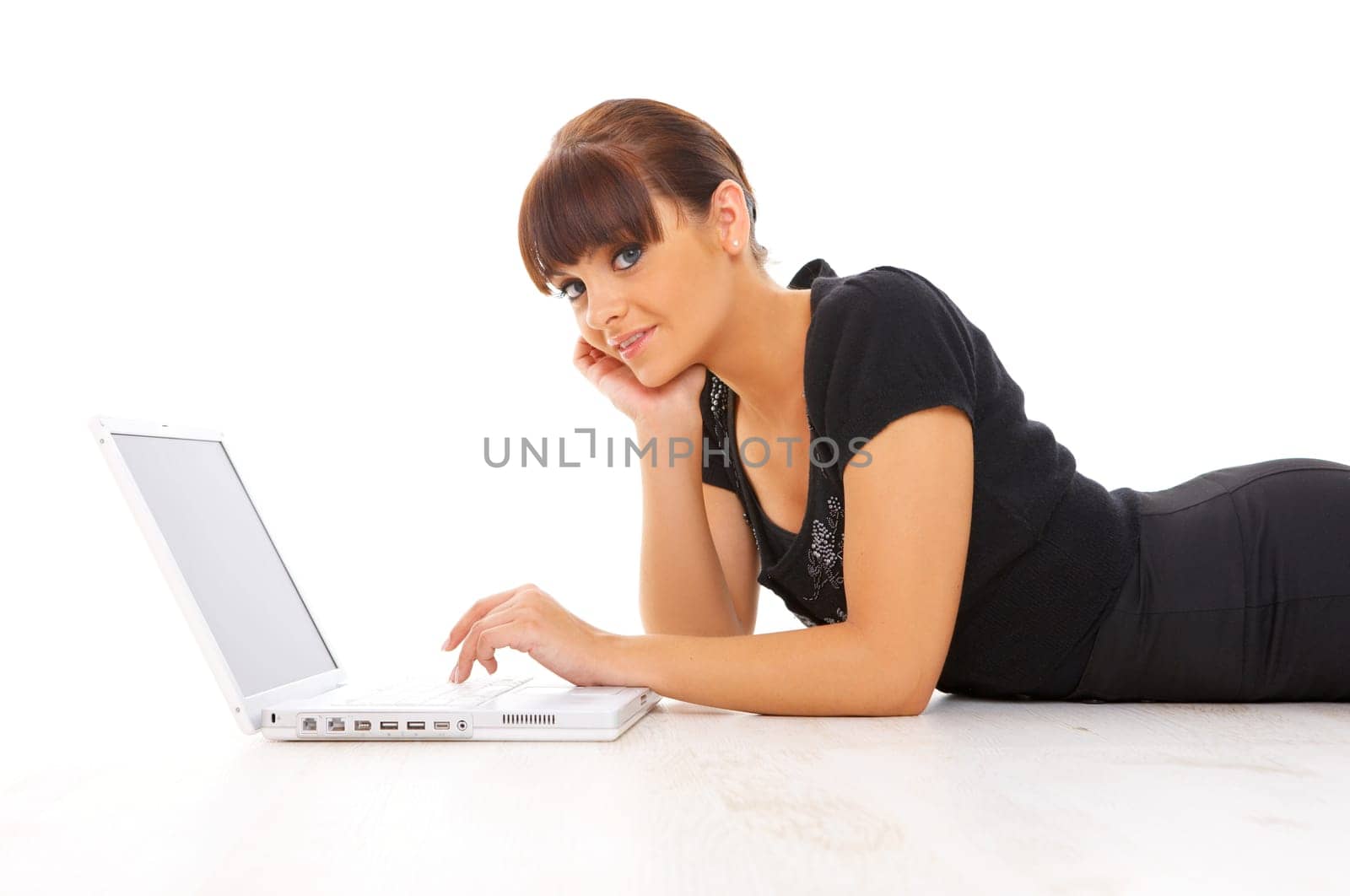 Portrait of young beautiful business woman working on computer