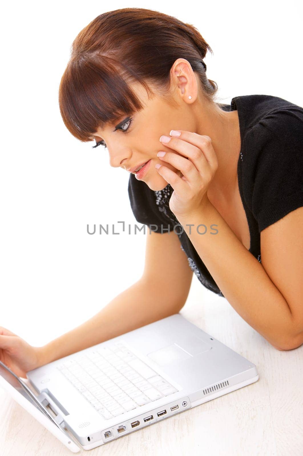Portrait of young beautiful business woman working on computer