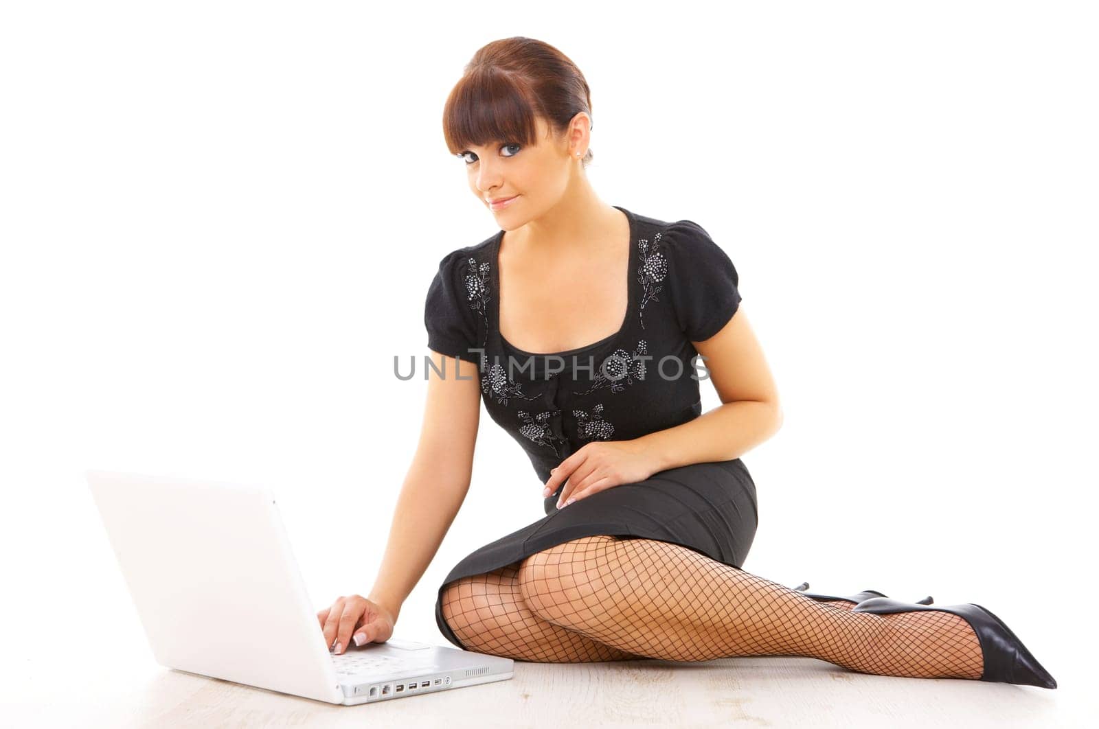 Portrait of young beautiful business woman working on computer