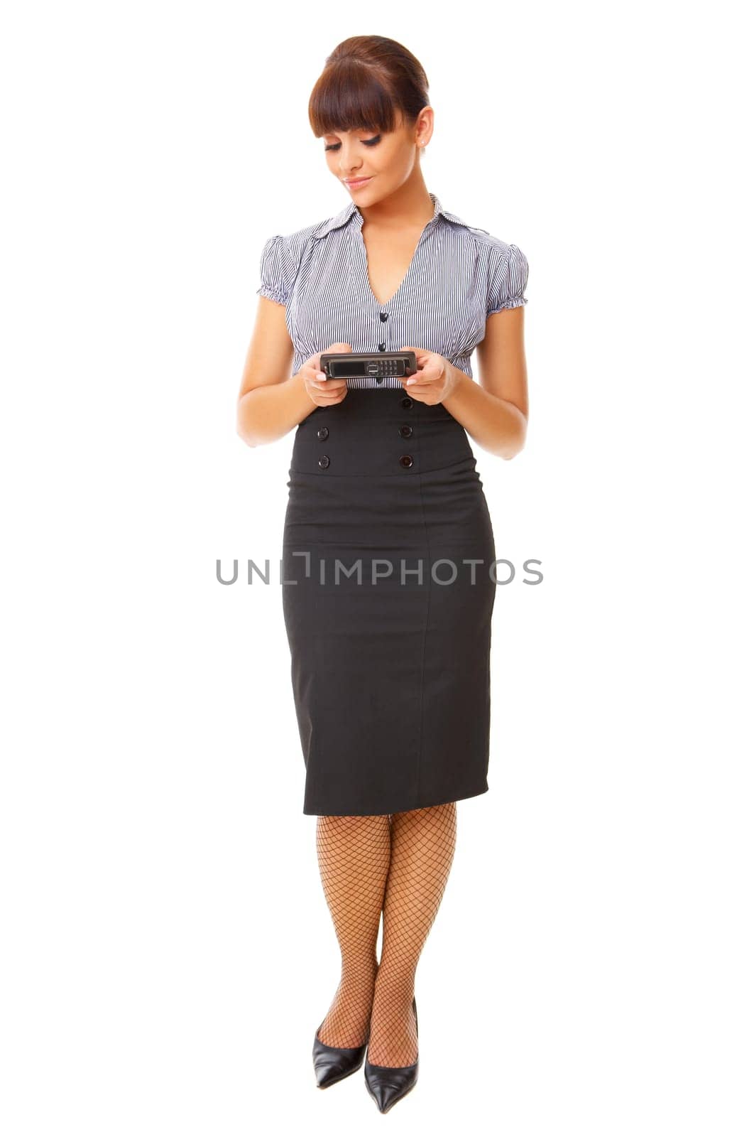 Beautiful business woman is using mobile telephone