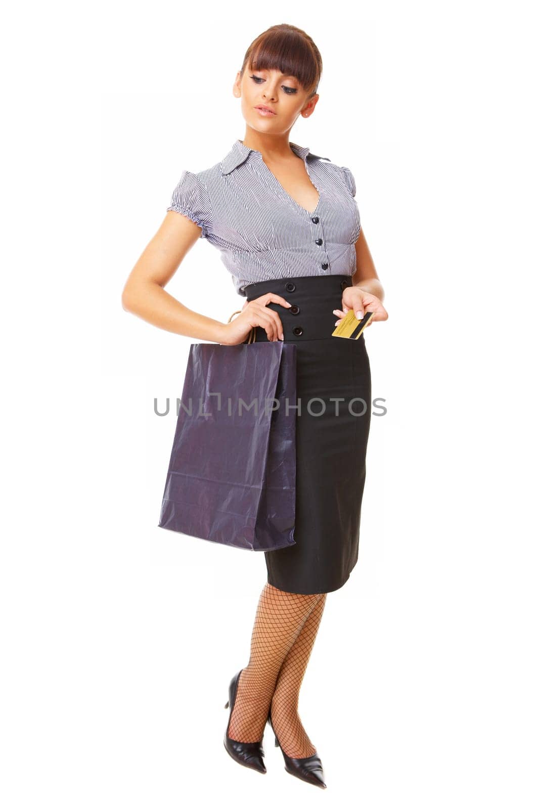 Attractive woman with paper shopping bag