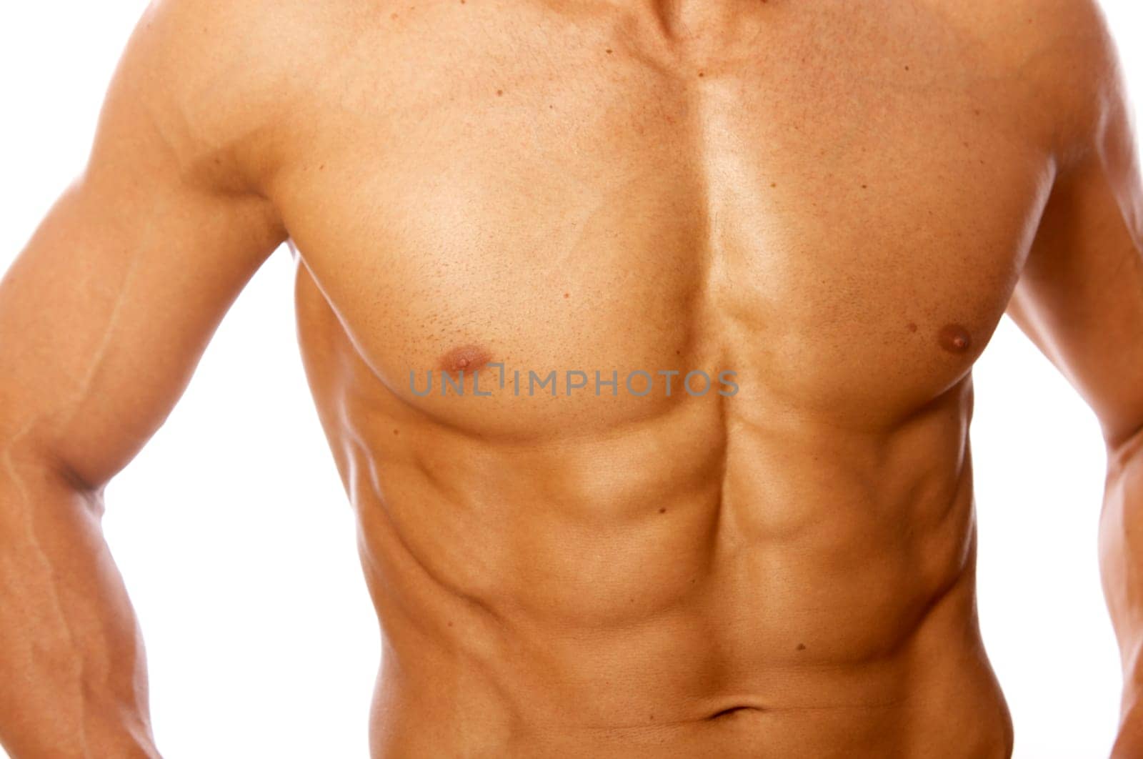 Muscular and tanned male torso isolated on white