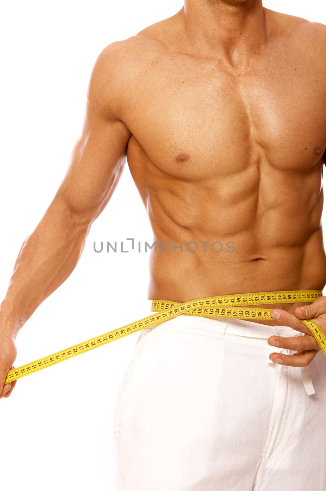 Muscular and tanned male body parts is being measured