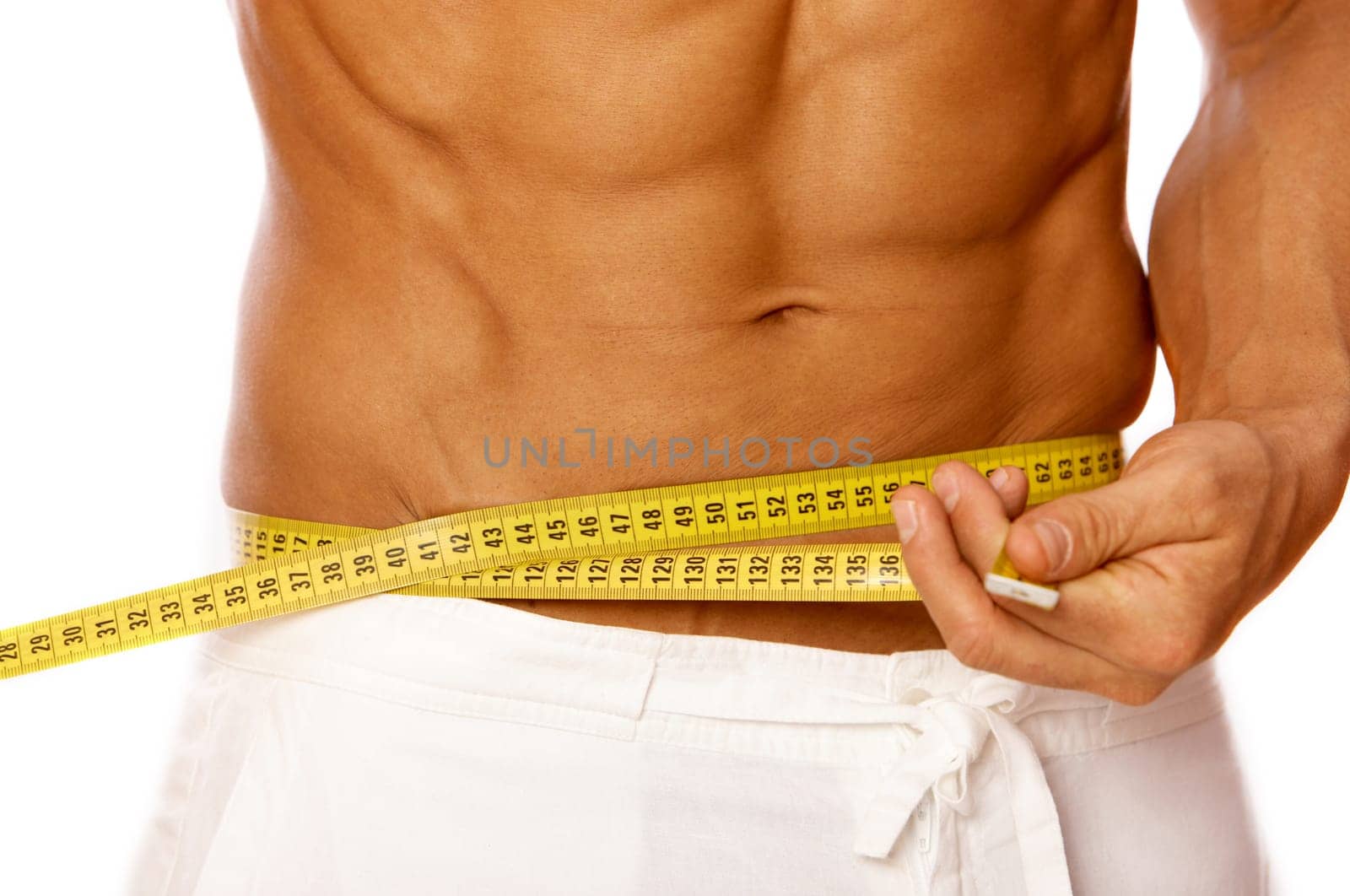 Muscular and tanned male body parts is being measured