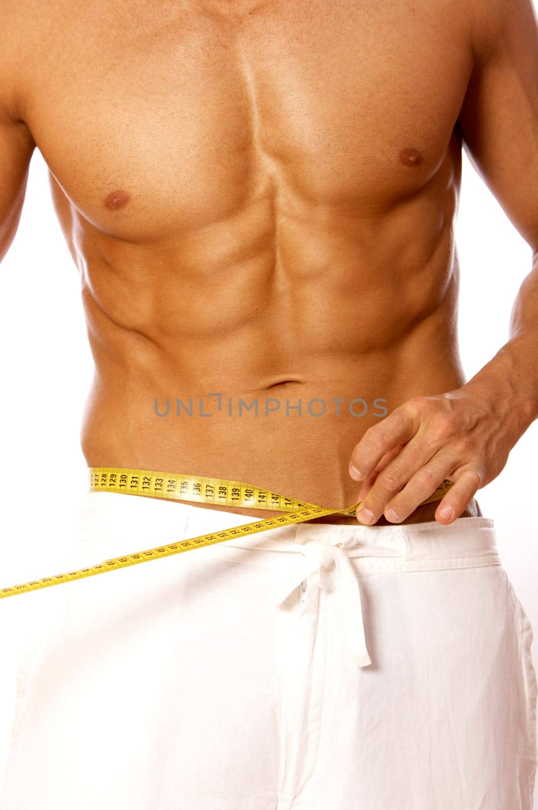 Muscular and tanned male body parts is being measured