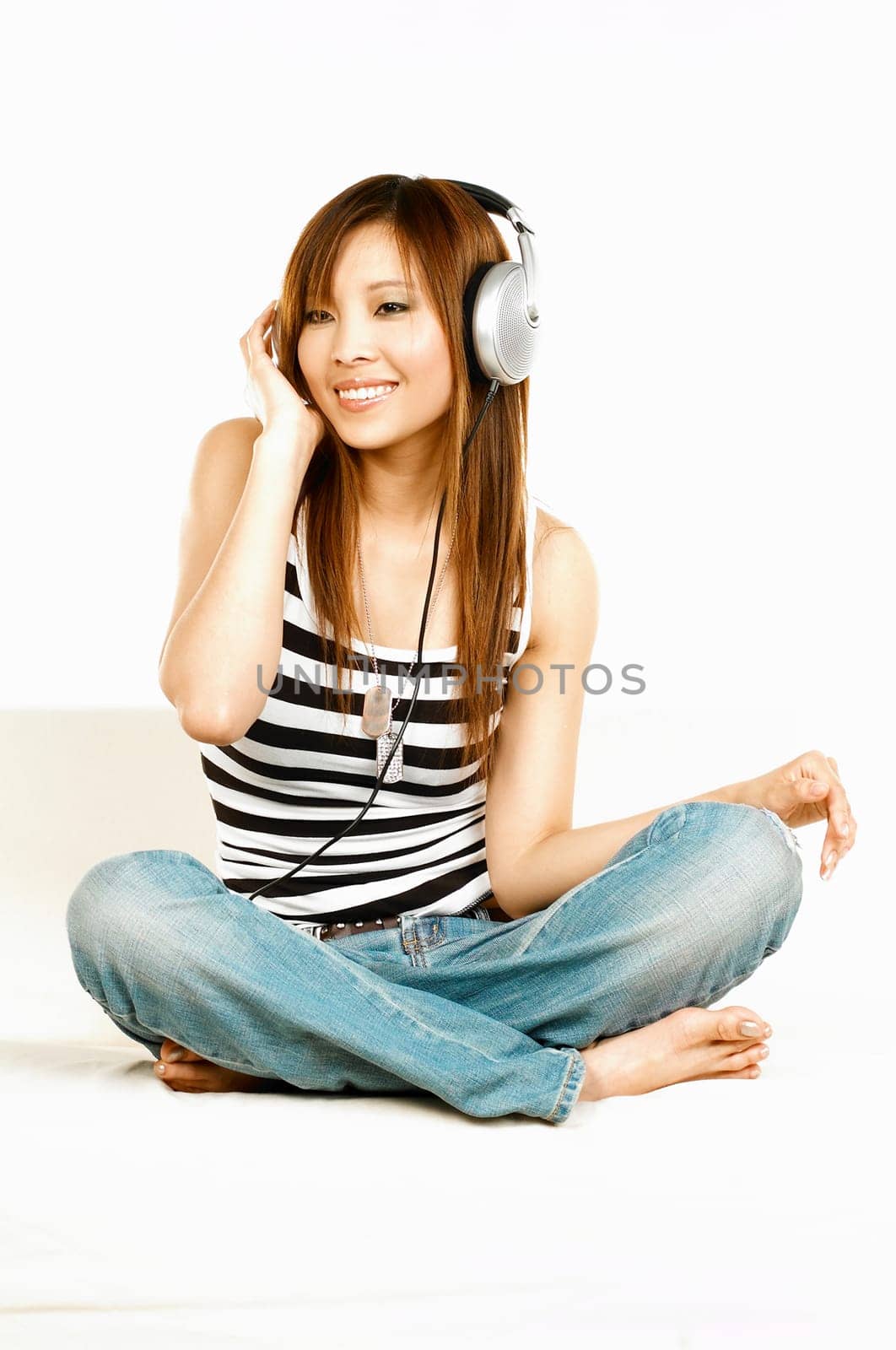 Young asian beautiful women is listening to the music