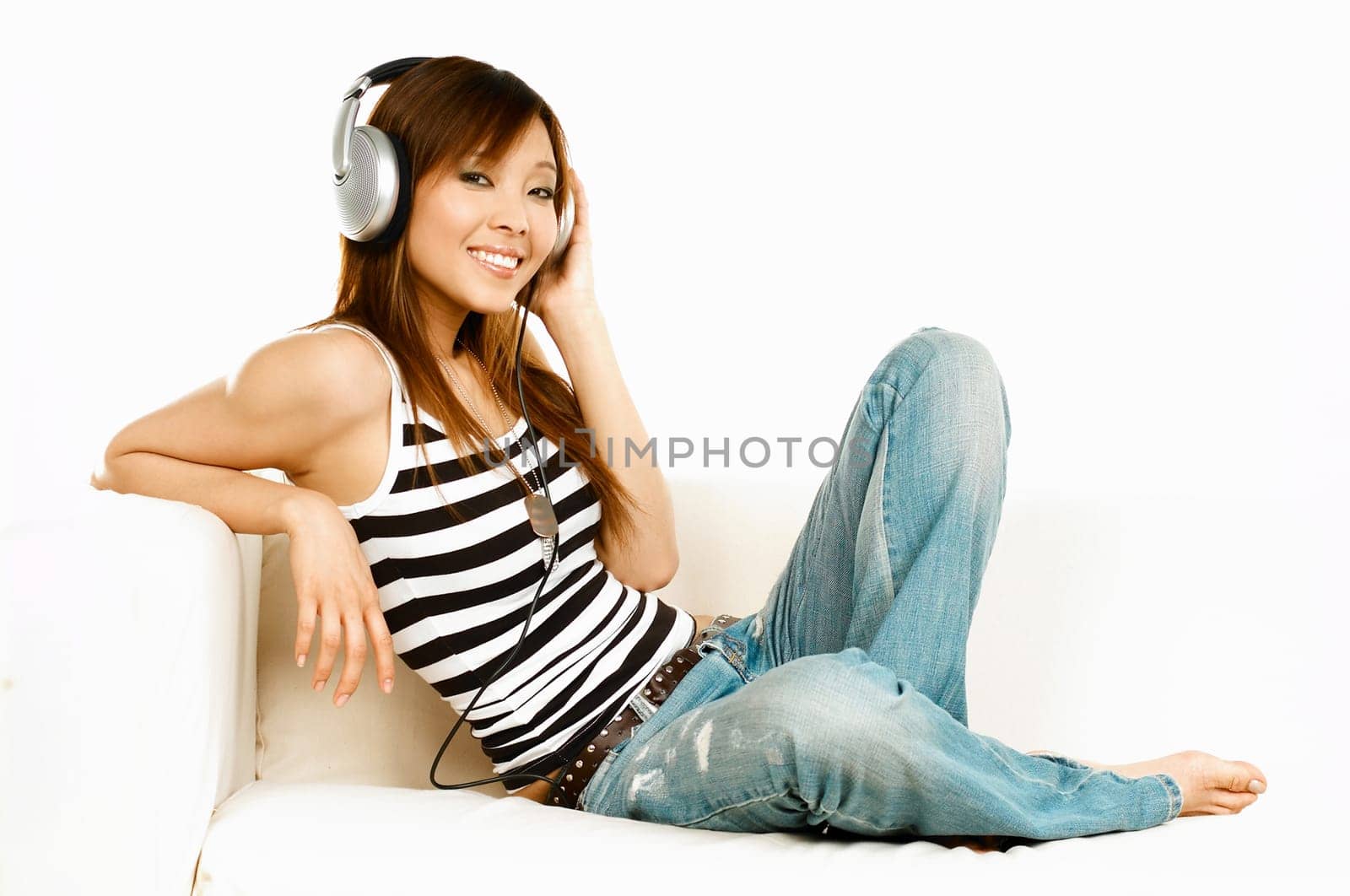 Young asian beautiful women is listening to the music