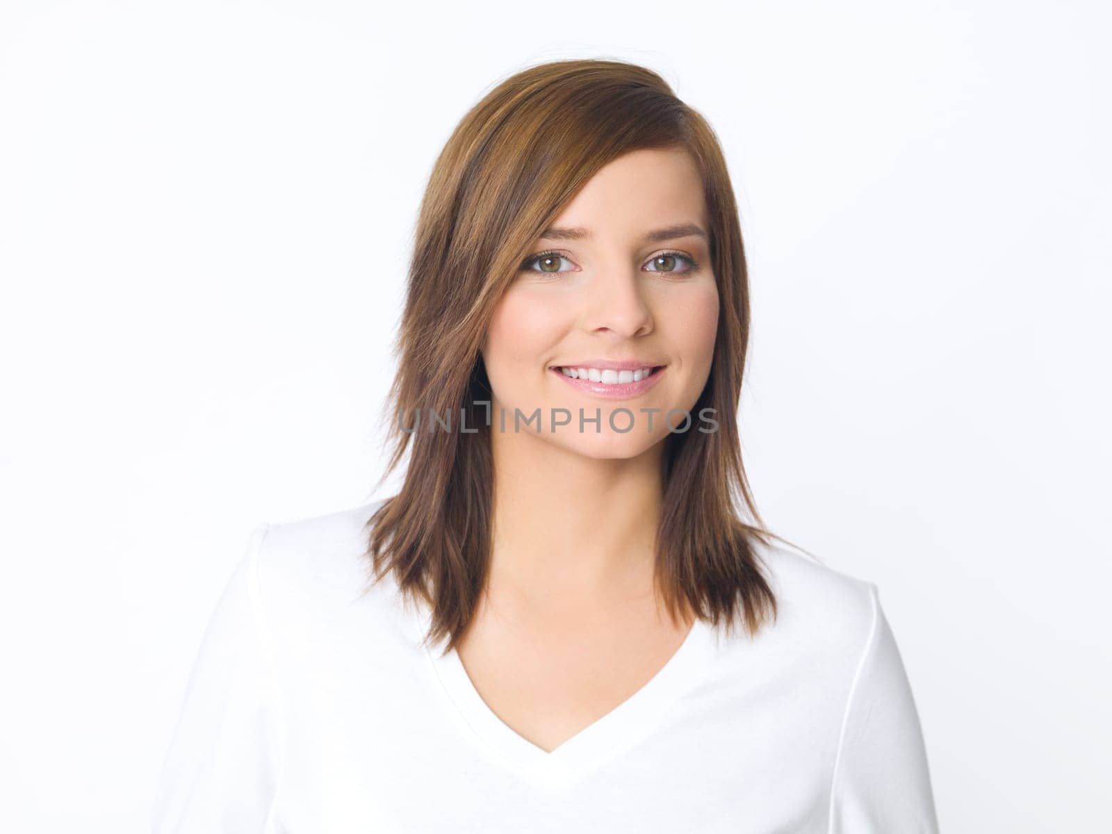 Portrait of beautiful young woman wearing white blouse
