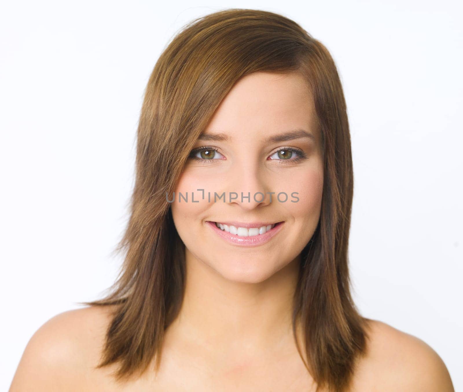 Portrait of beautiful young woman on white background