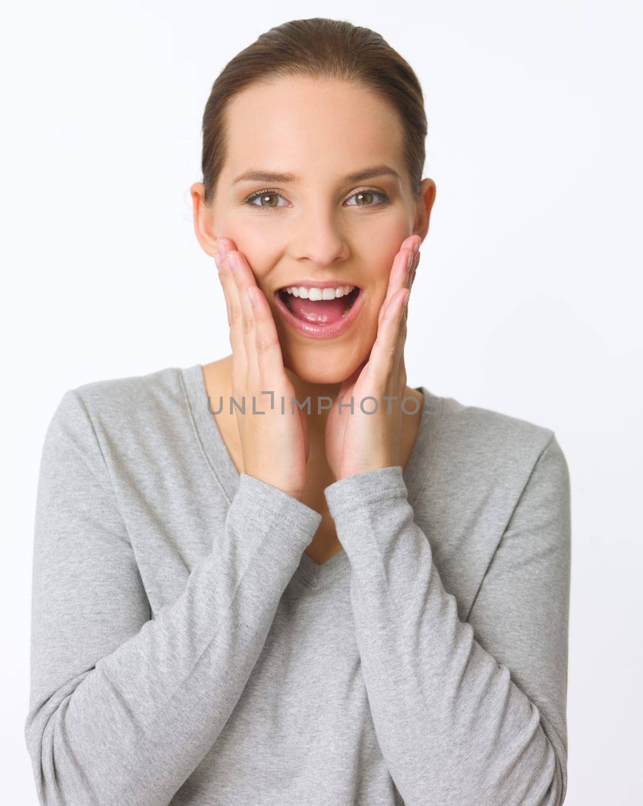 Portrait of beautiful young woman showing surpise gesture