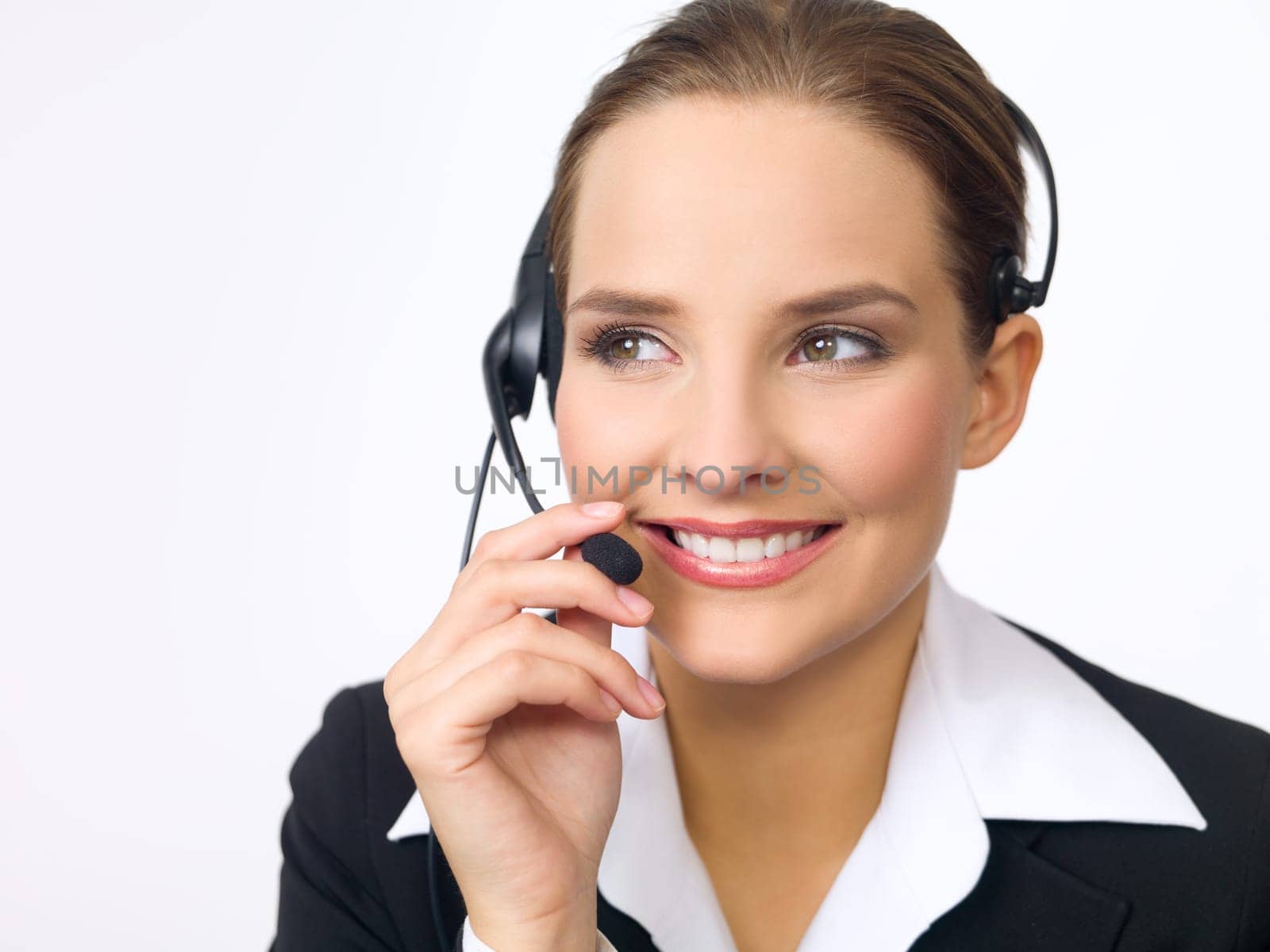 Portrait of beautiful and young business woman with headphones