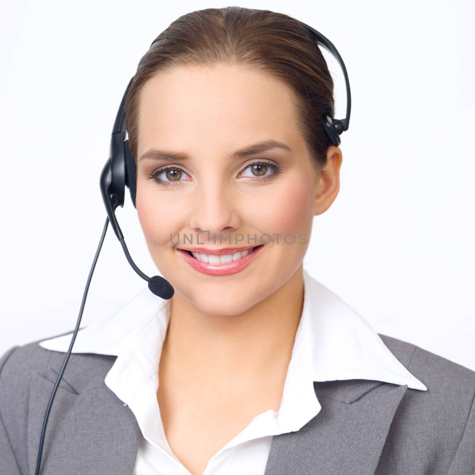 Portrait of beautiful and young business woman with headphones