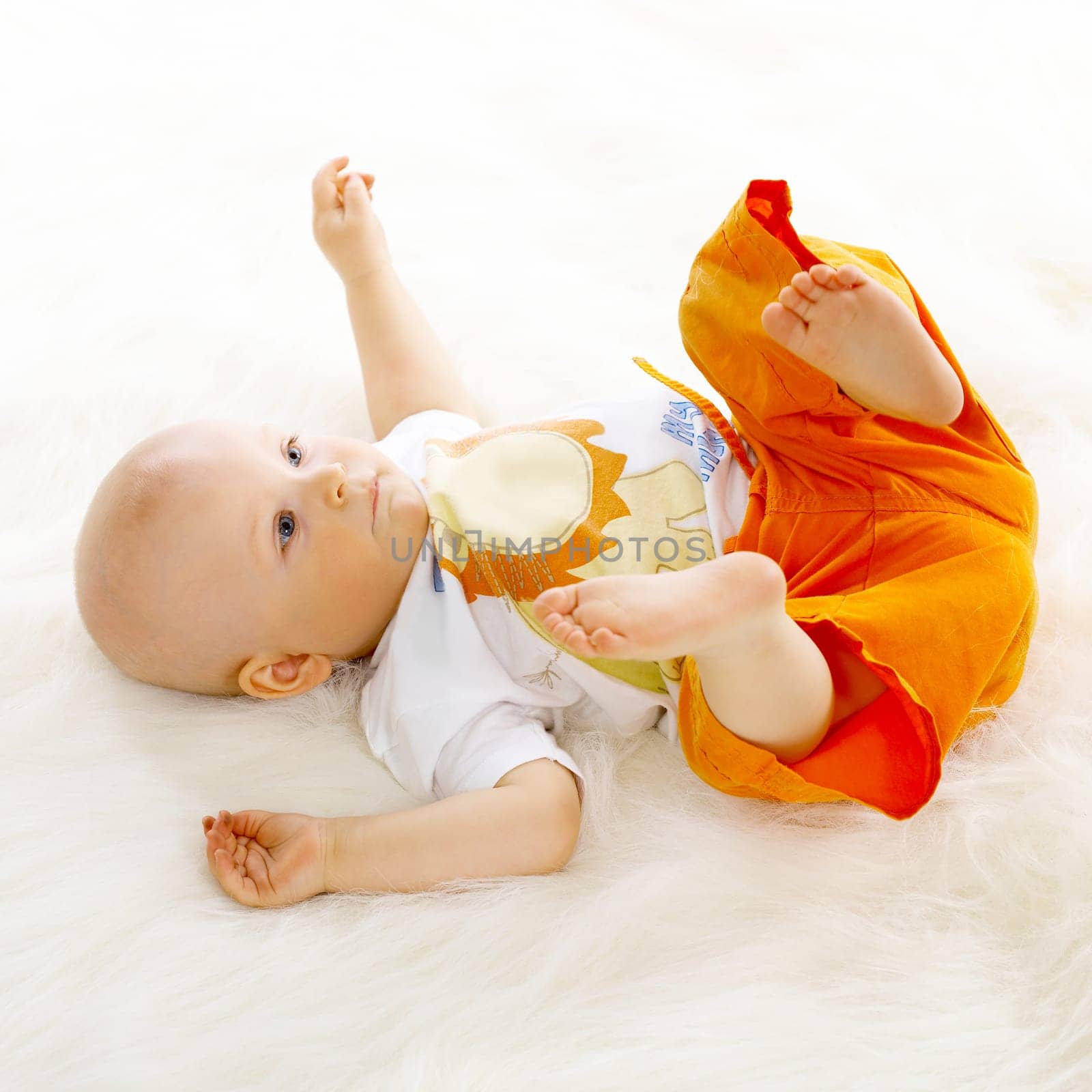 Portrait of sweet little baby boy on white background