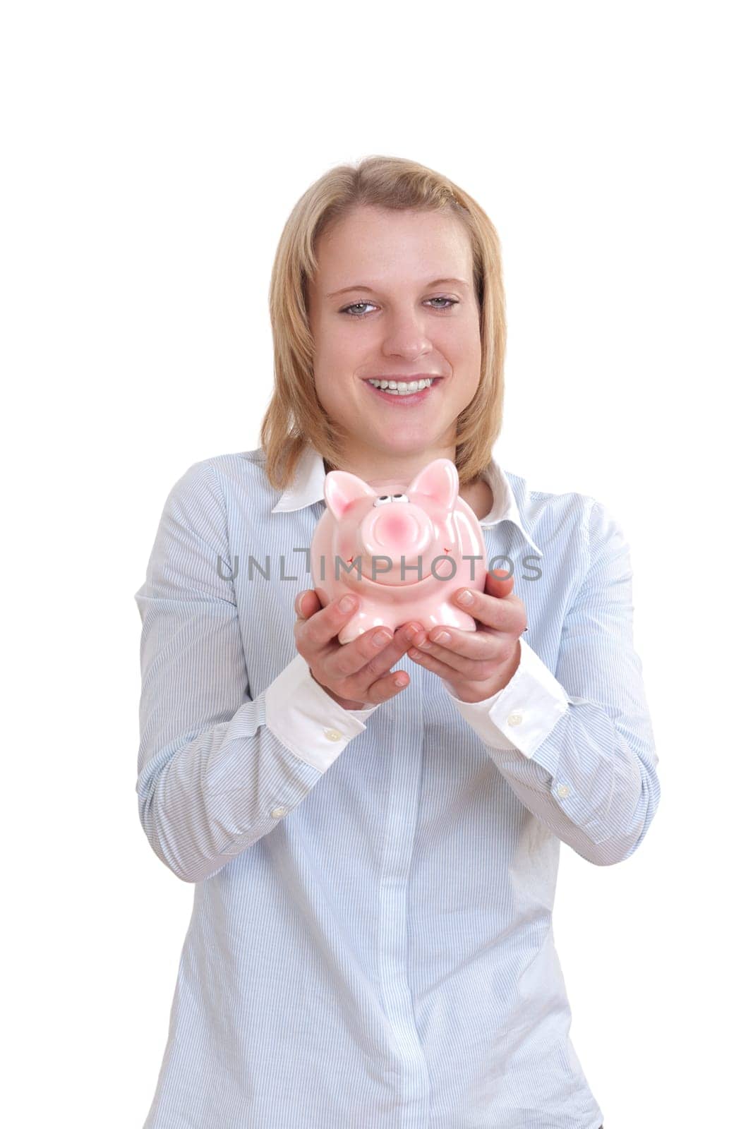 Young blonde woman holding a piggy bank with both hands