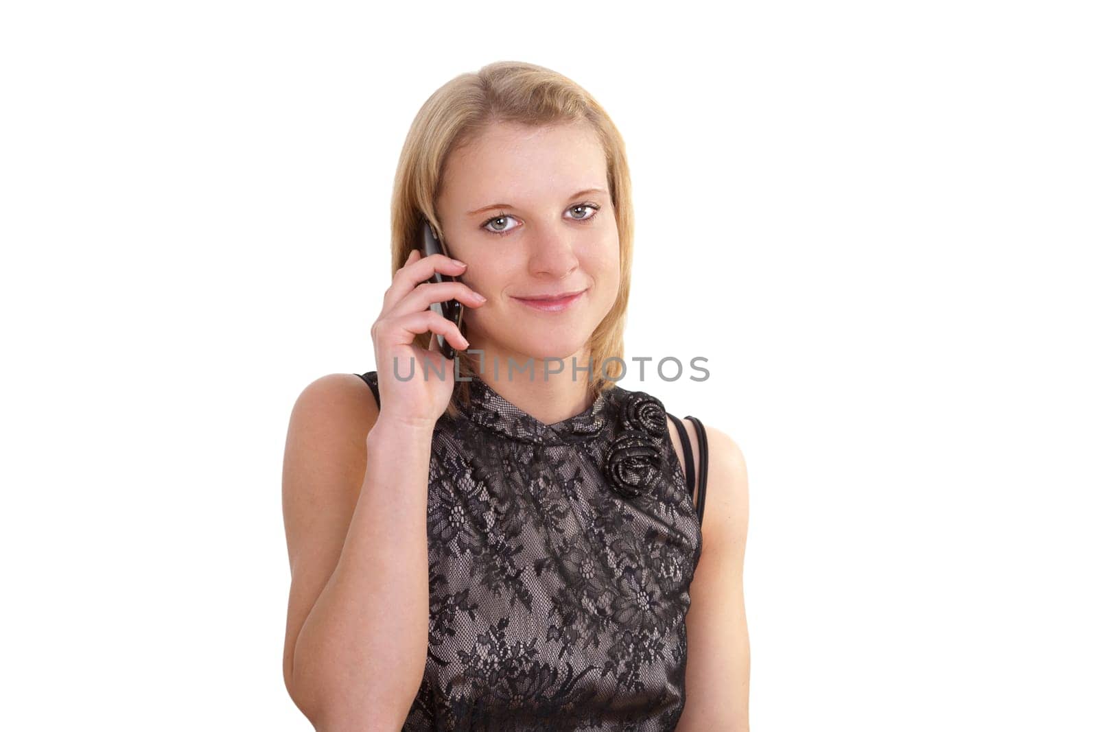 Young modern businesswoman using a smartphone talking on the phone against white background