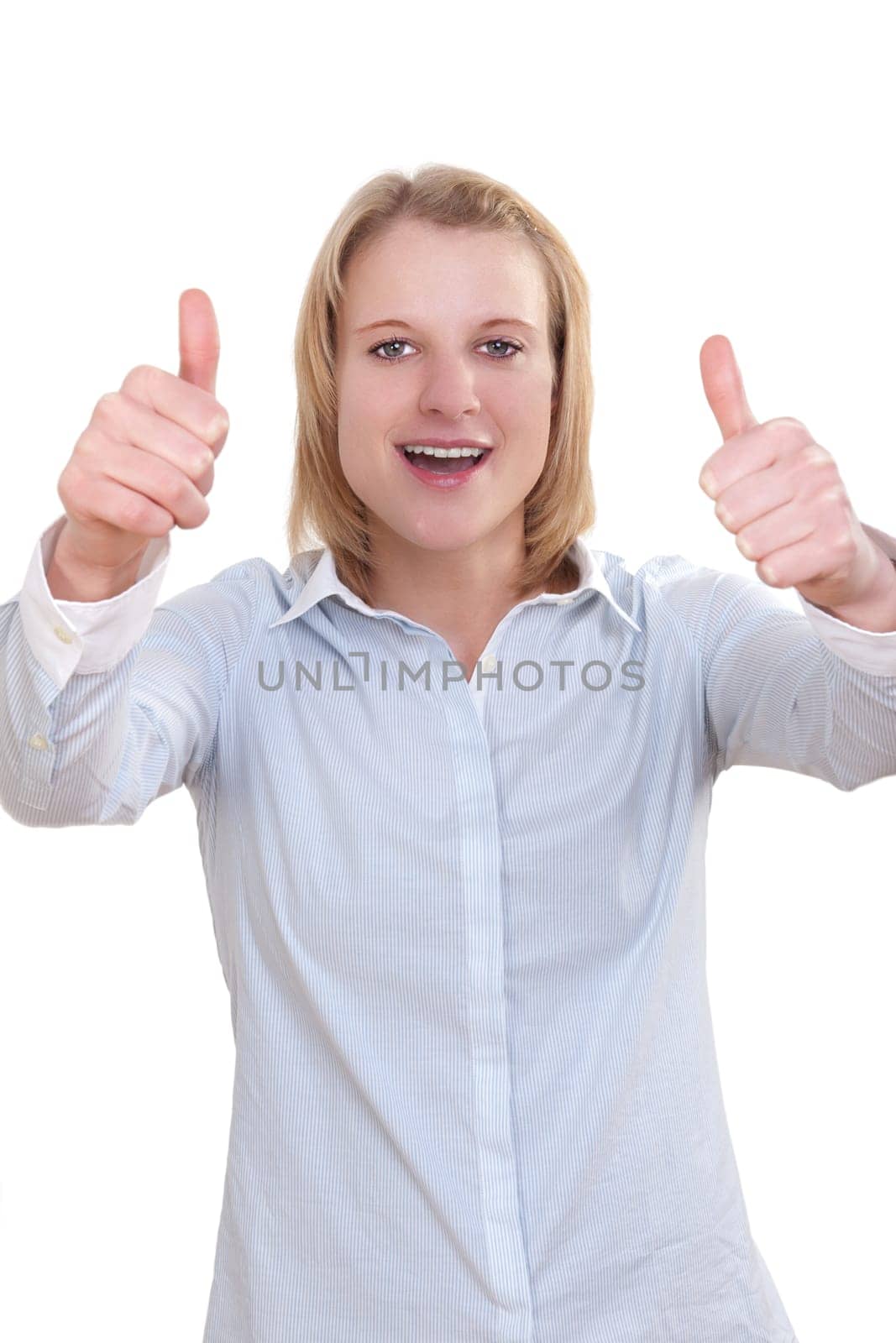Young attractive woman holding both thumbs up against white background