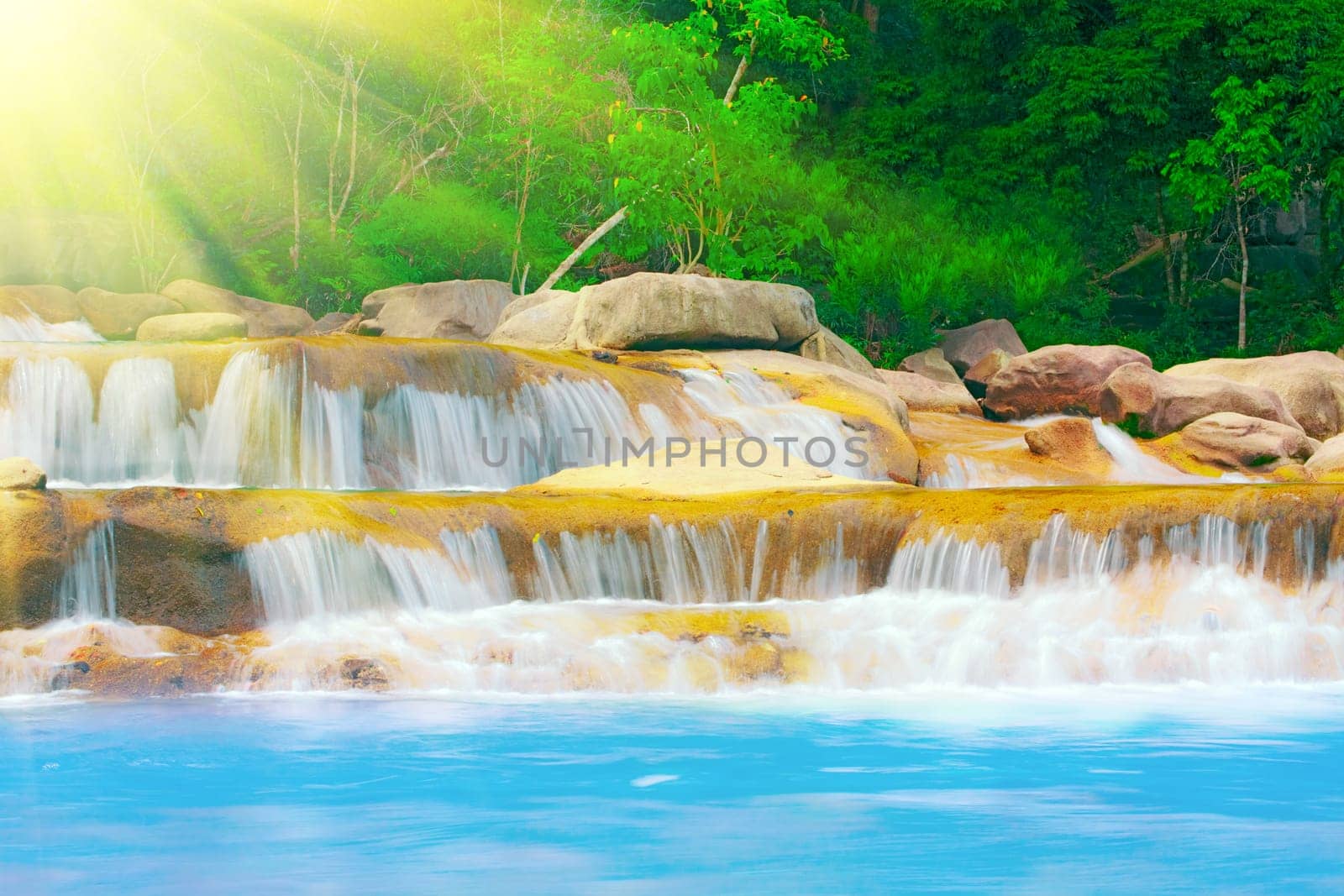 beautiful cascade fall in tropical forest