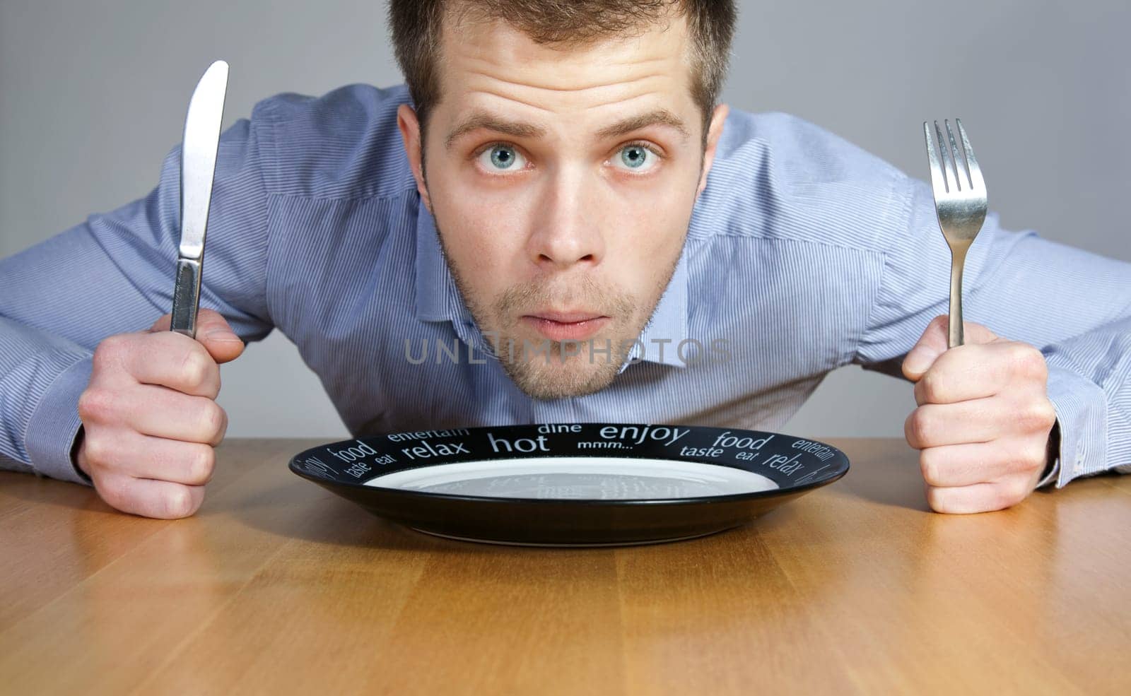Hungry man wating to be served
