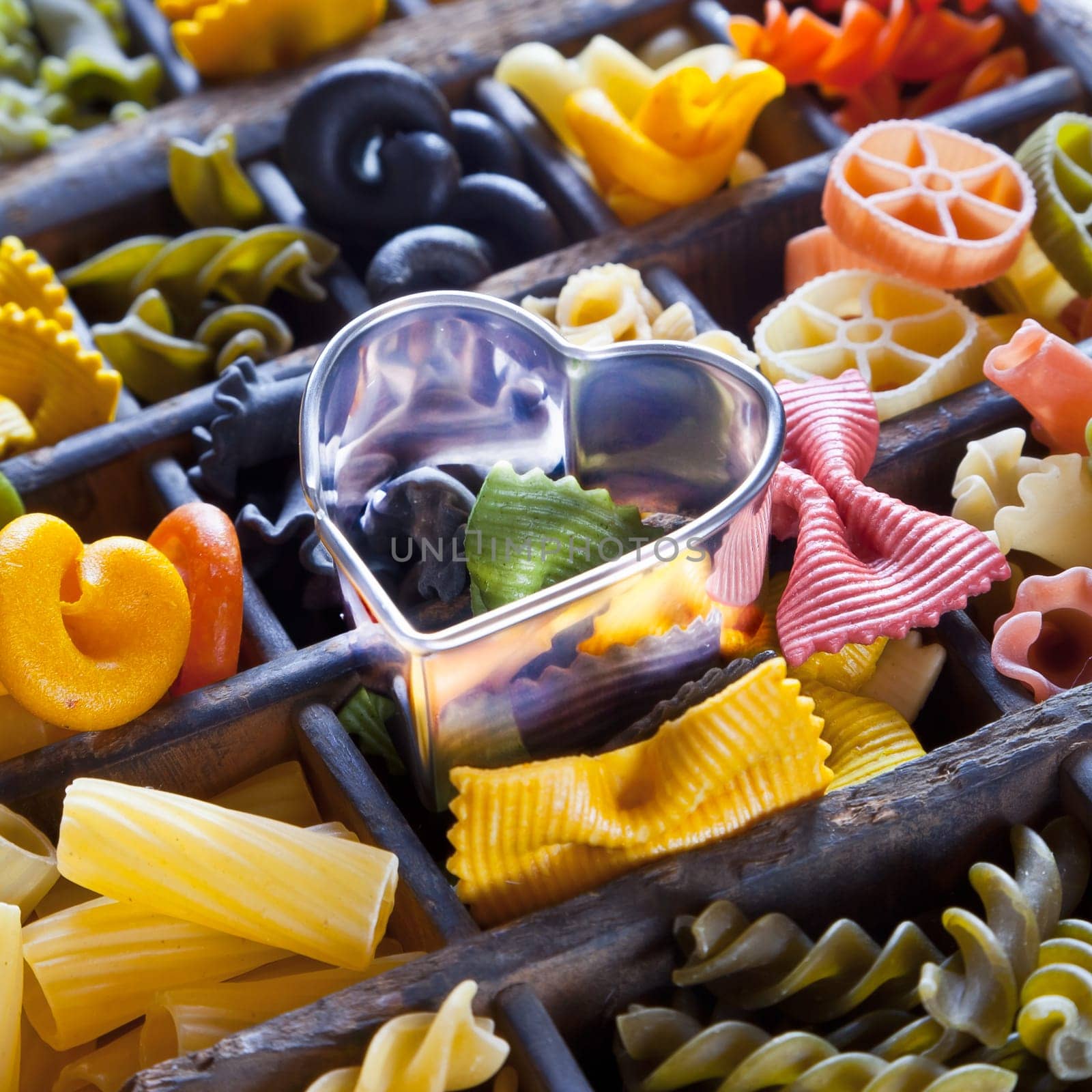Different colored Pasta in an old letter-box
