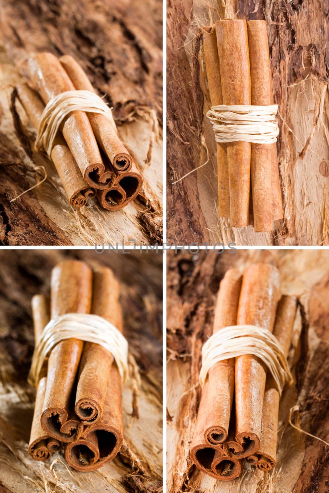 bunches of cinnamon sticks as a collage with a golden bow on a wooden background.