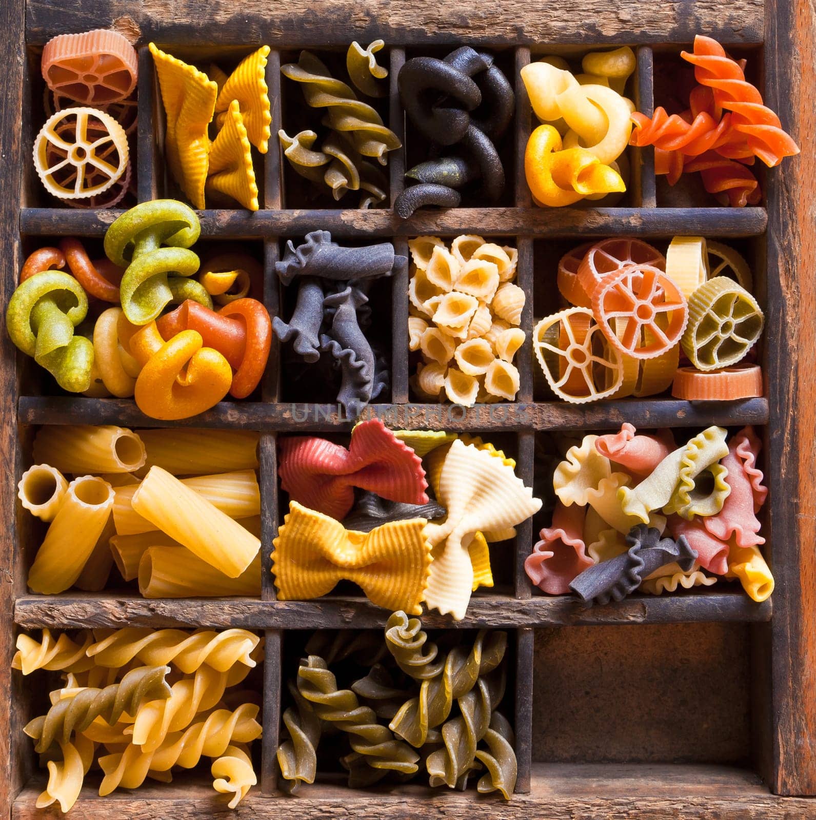 Different colored Pasta in an old letter-box
