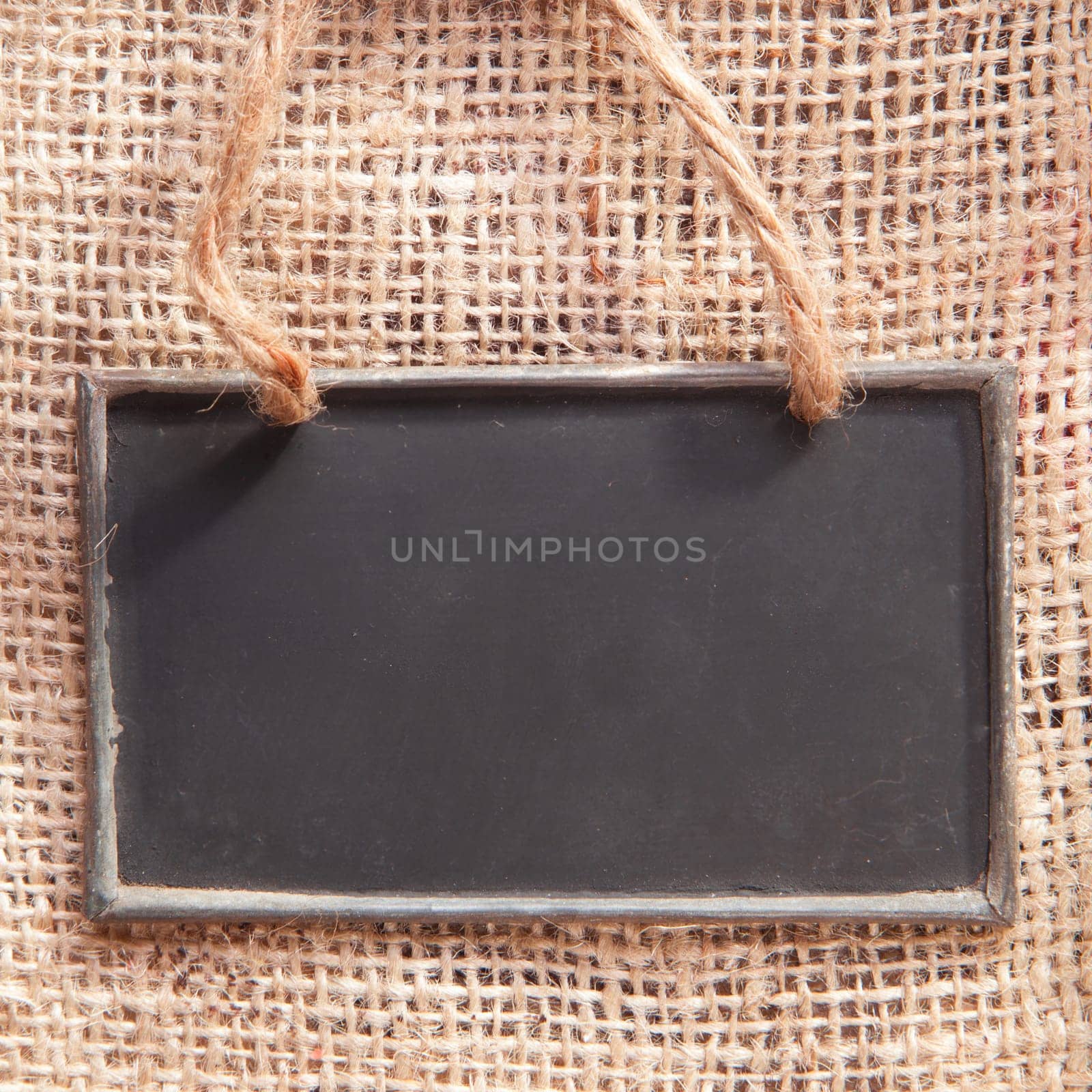 a chalkboard on a textile coffee bag
