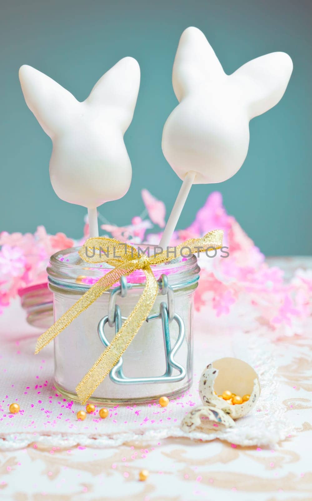 Happy Easter Cake pops with a bow and pink flowers