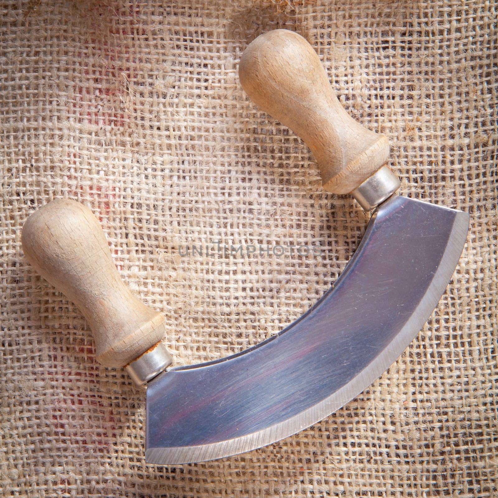 chopping-knife on a fabric coffee bag background