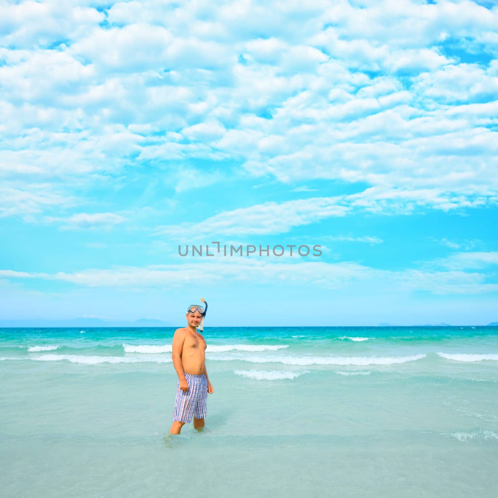 Men with mask and snorkel in the sea