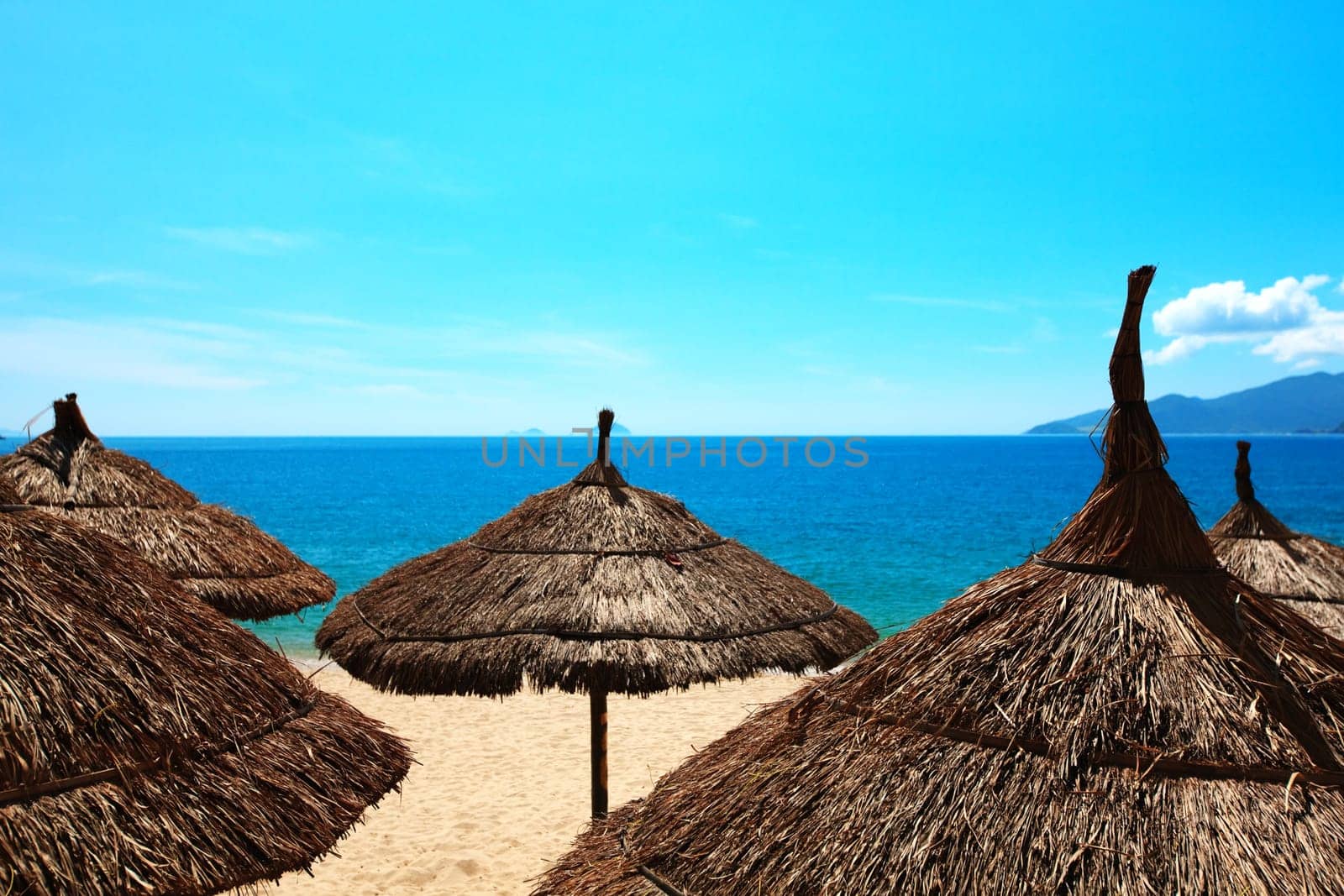 Top of beach umbrellas at sunny day