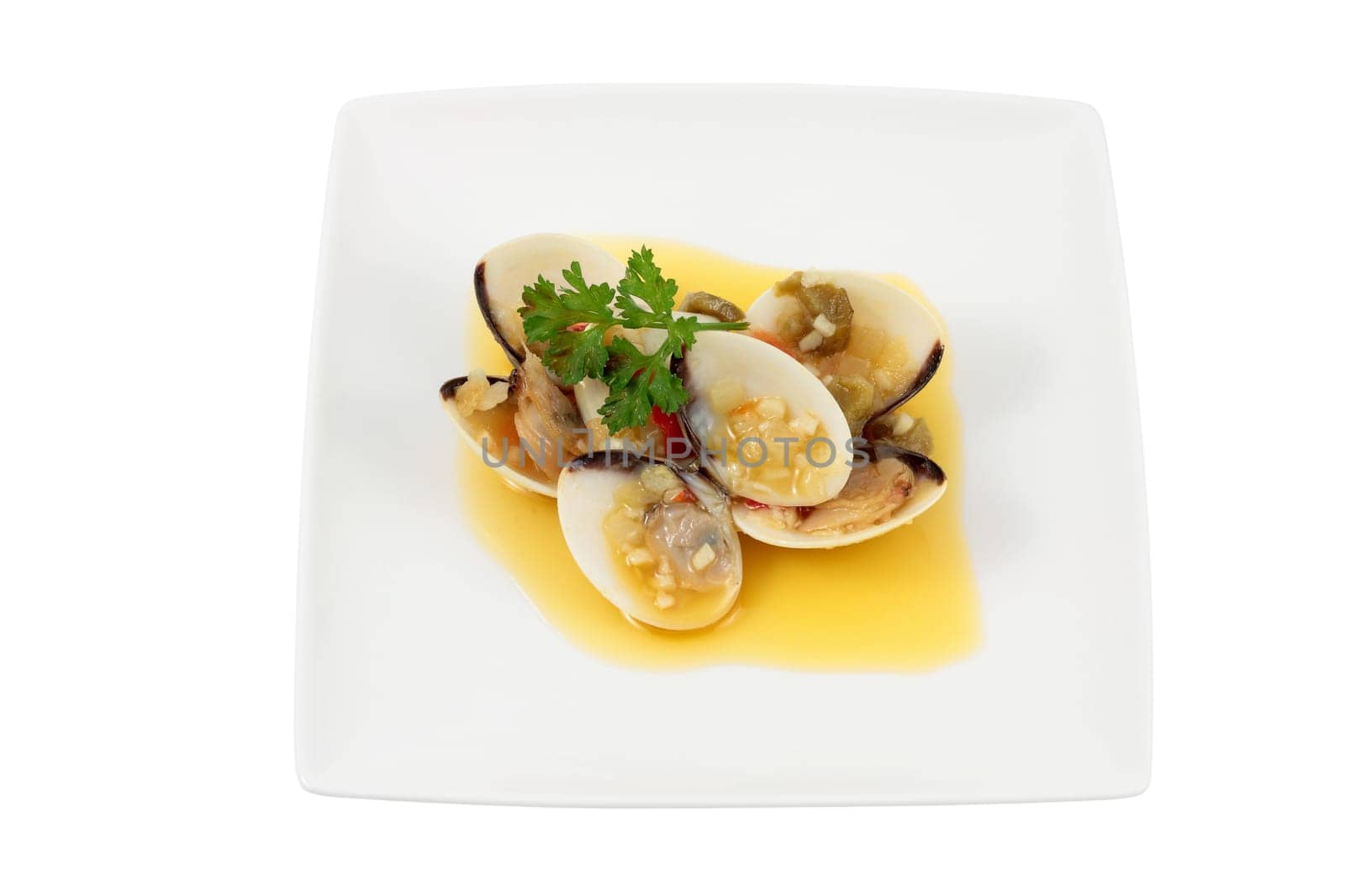 dish of clams in wine sauce and olive oil with chopped parsley and garlic pepper onion cut off and isolated