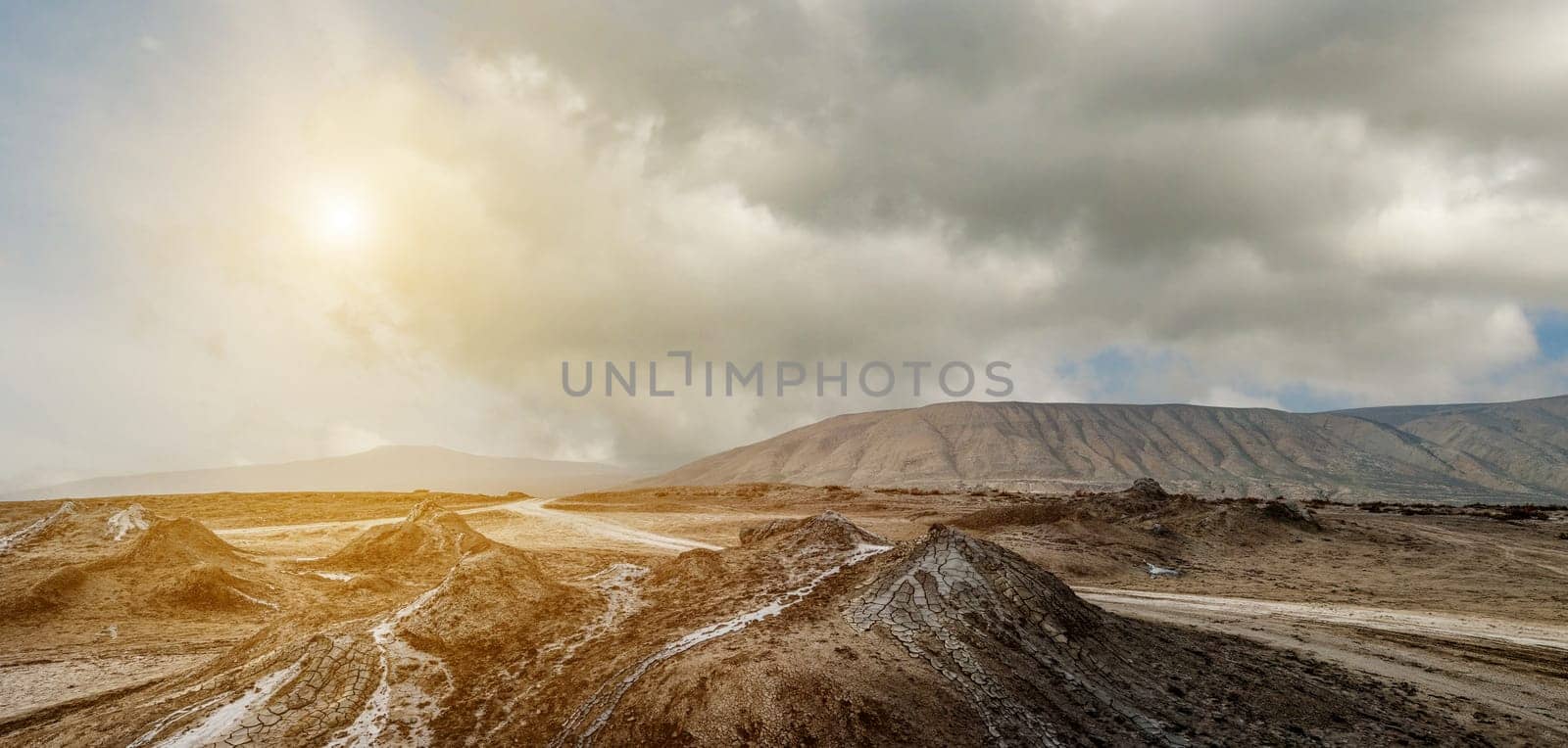 Panoramic view of mud volcanoes valley at sunset in Gobustan national park, Azerbaijan