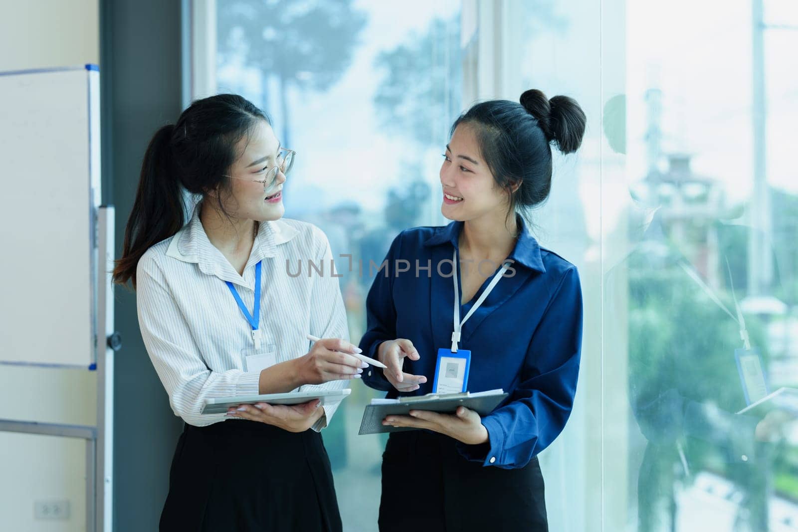 startup business, business advisor explaining strategy for planning finance investment teamwork paperwork audit and discussing marketing, profit, budget of company in meeting room