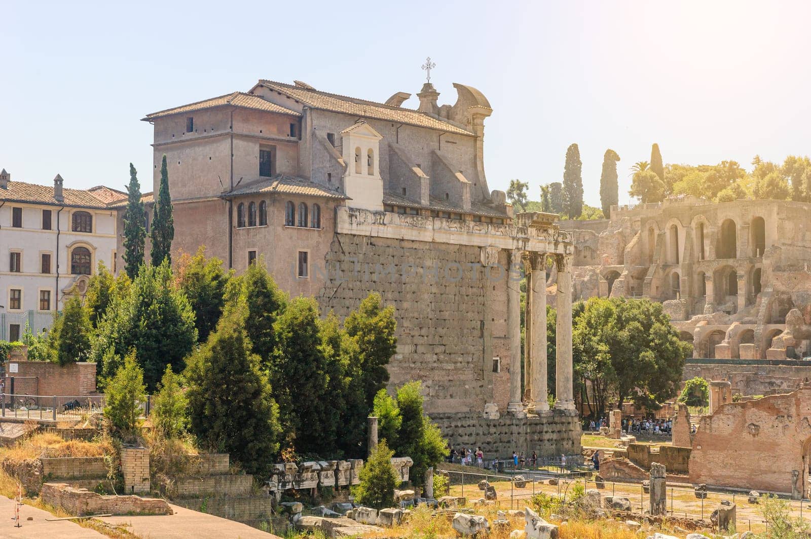 View of the Roman Forum with the Temple of Antoninus and Faustina in the foreground, later converted into a church (San Lorenzo in Miranda), with the Palatine Hill in the background