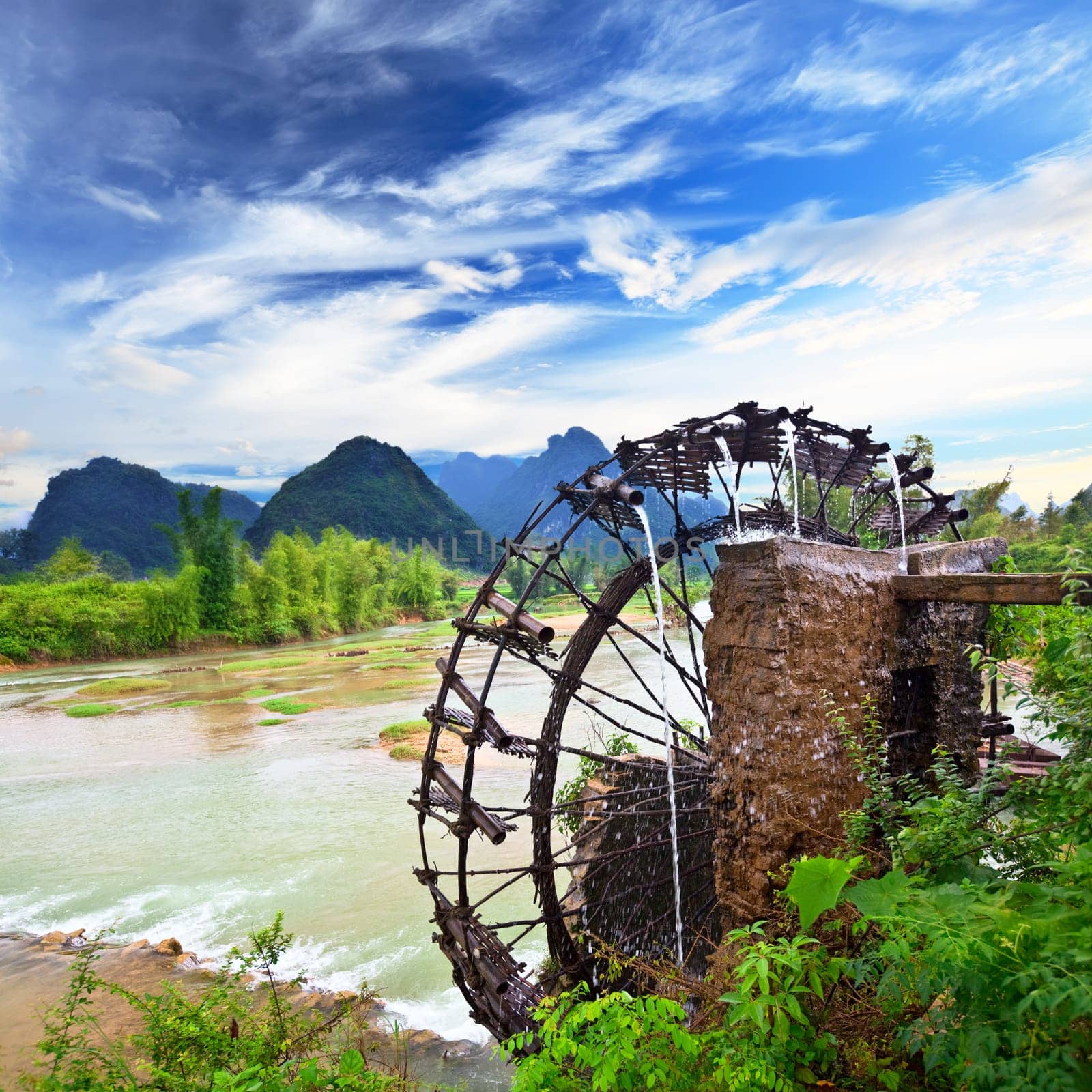 Bamboo water wheel. The use of water power for irrigation. Vietnam