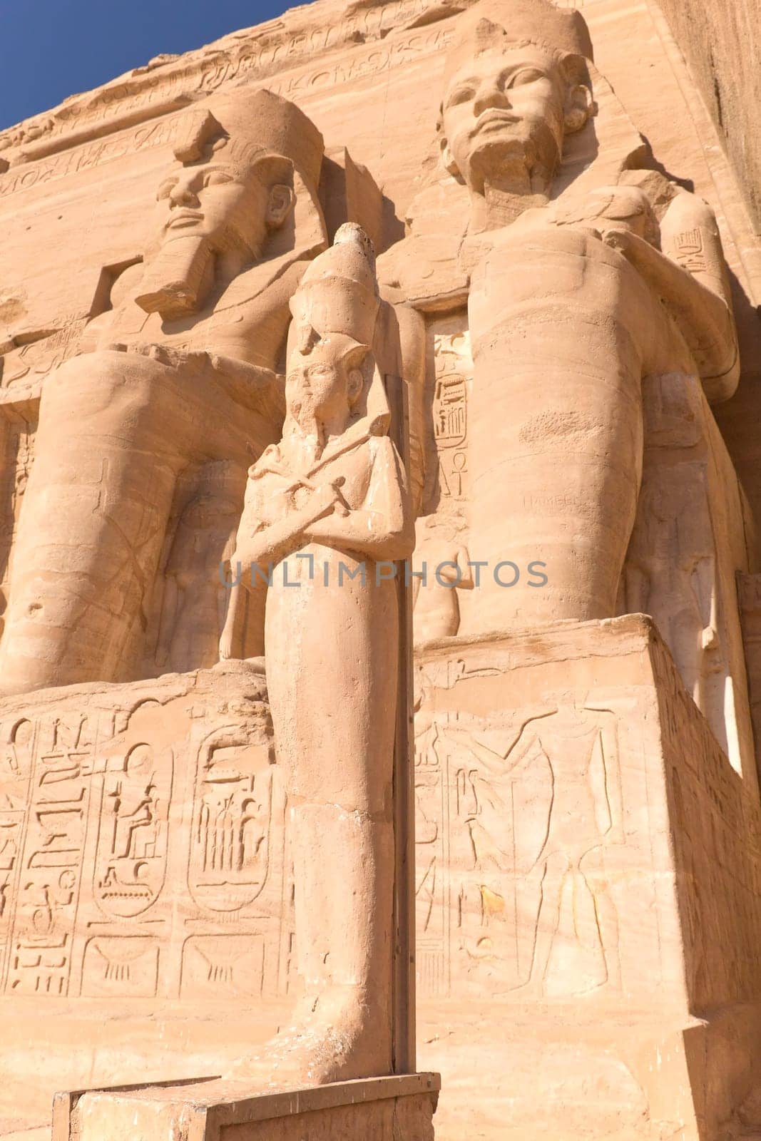 Sculptures of King Ramses II and queen Nefertari in Abu Simbel Temple (Egypt)
