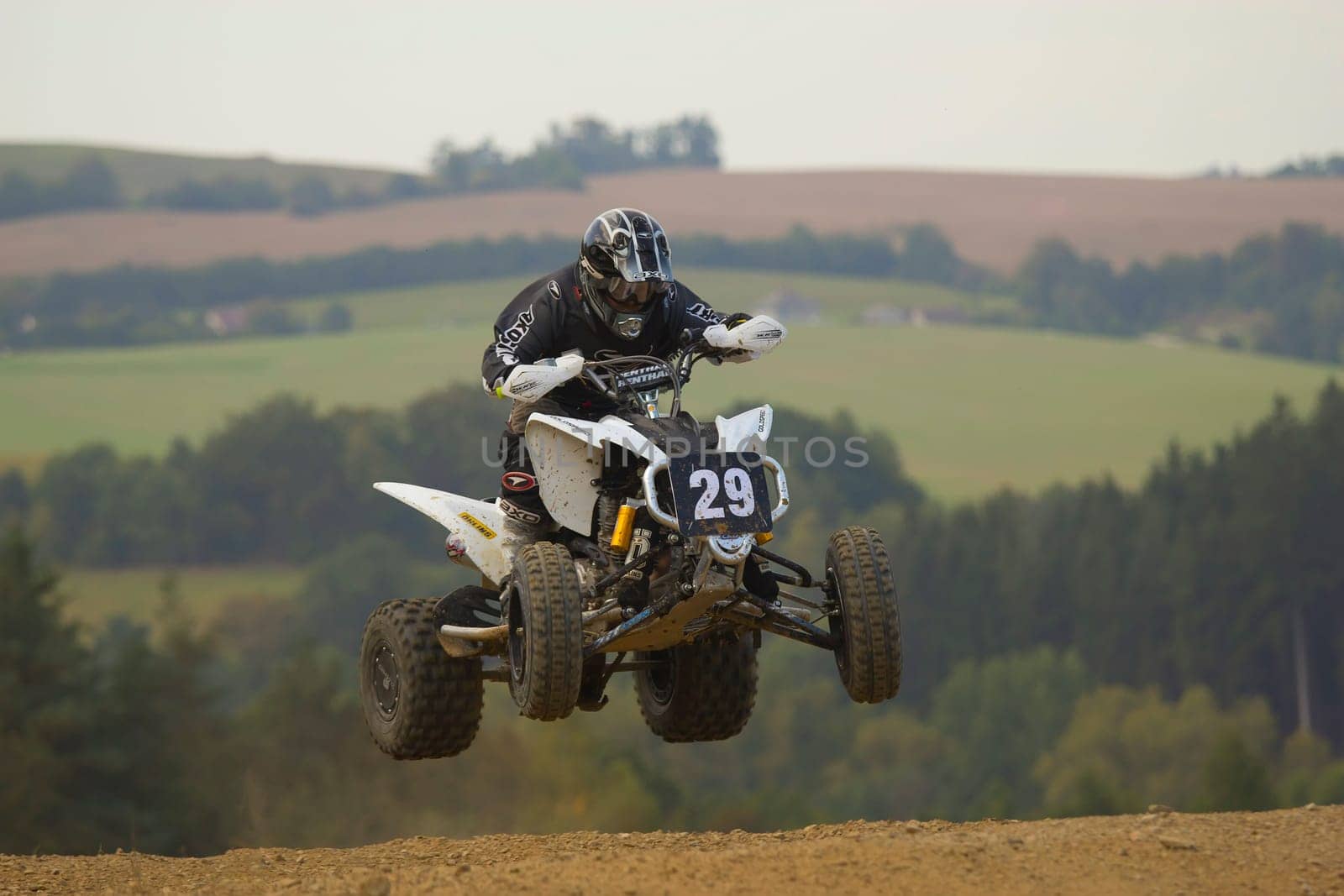 MOHELNICE, CZECH REPUBLIC - SEPTEMBER 17. Unidentified racer jump with a quad motorbike in the "Czech Republic Cup 2011"" on September 17, 2011 in the town of Mohelnice, Czech Republic."