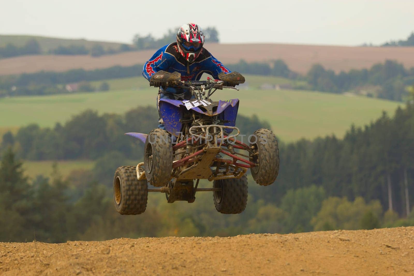 MOHELNICE, CZECH REPUBLIC - SEPTEMBER 17. Unidentified racer jump with a quad motorbike in the "Czech Republic Cup 2011"" on September 17, 2011 in the town of Mohelnice, Czech Republic."