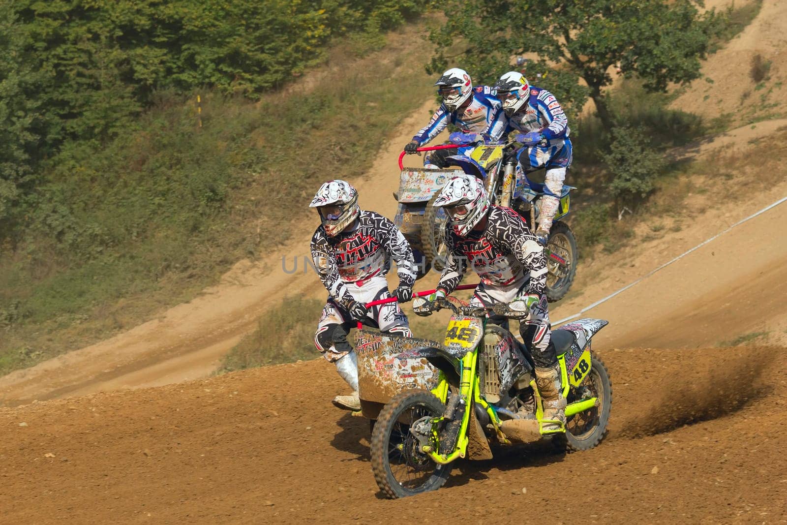 MOHELNICE, CZECH REPUBLIC - SEPTEMBER 17. Unidentified racers rides a sidecar in the "Sidecarcross Championship of Czech Republic"" on September 17, 2011 in the town of Mohelnice, Czech Republic."