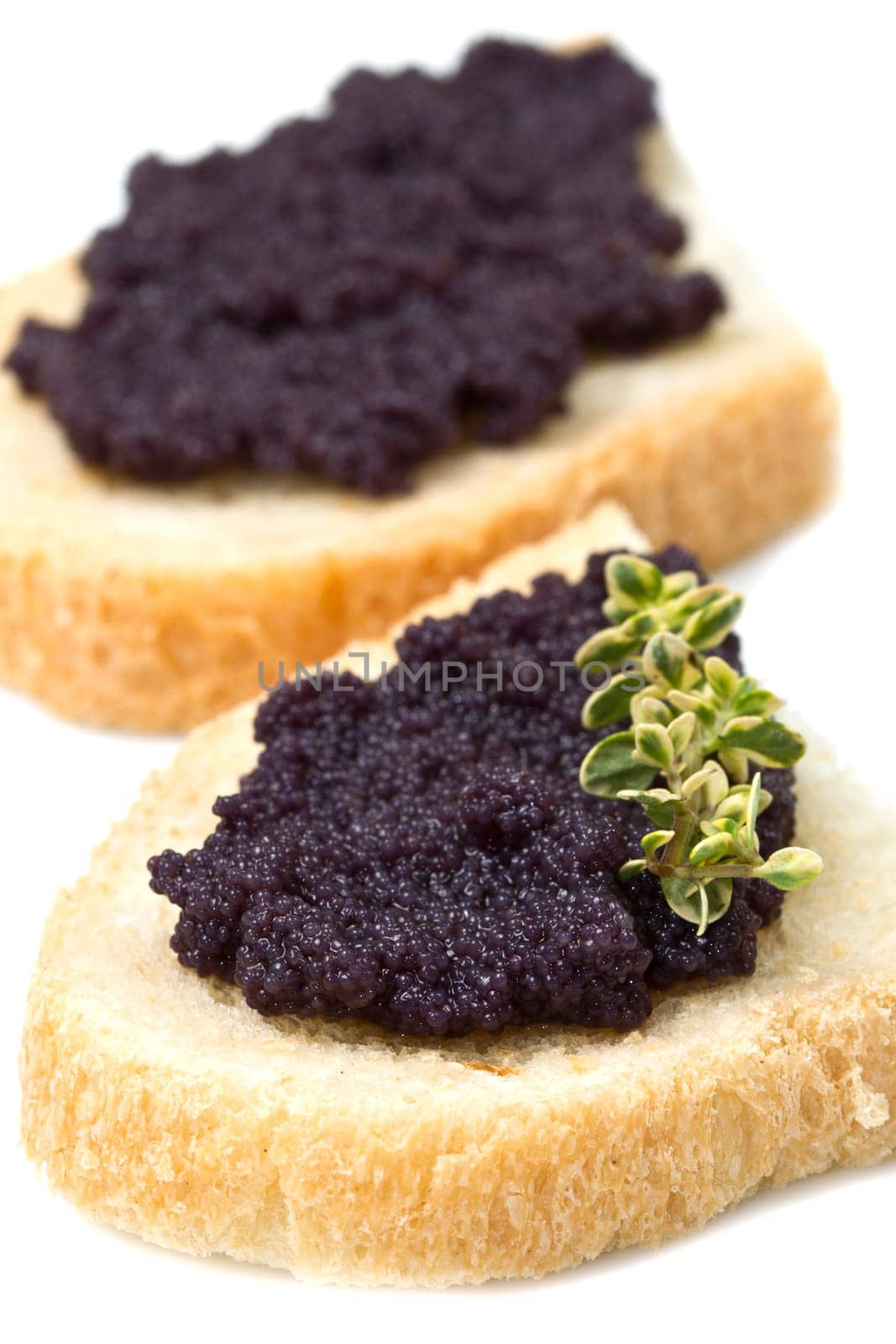 caviar canape on white background