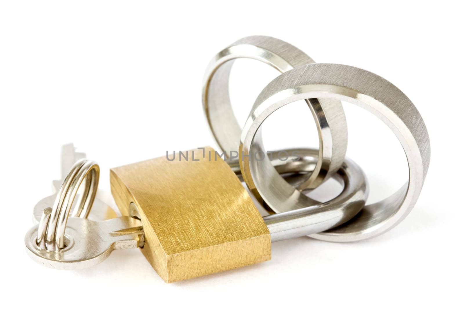 Together forever concept. golden padlock with wedding rings on white background