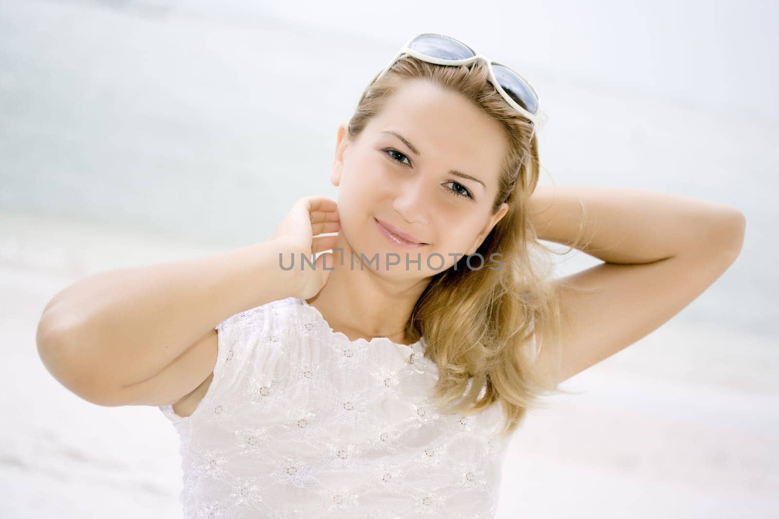 Portrait of young woman on blur natural background