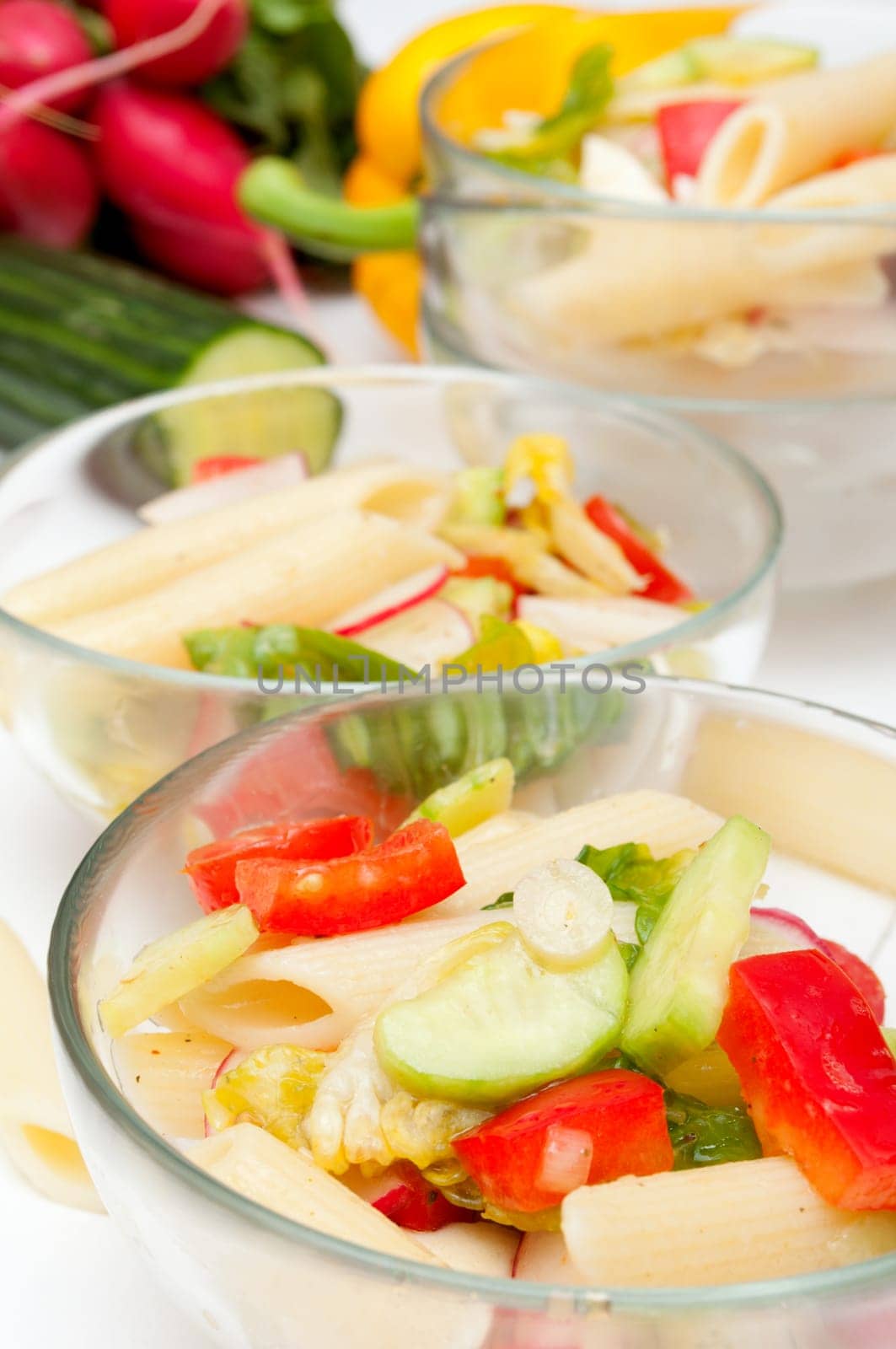 Fresh Pasta Salad With Tomatoes, Pepper, Cucumber, Radish and Lettuce