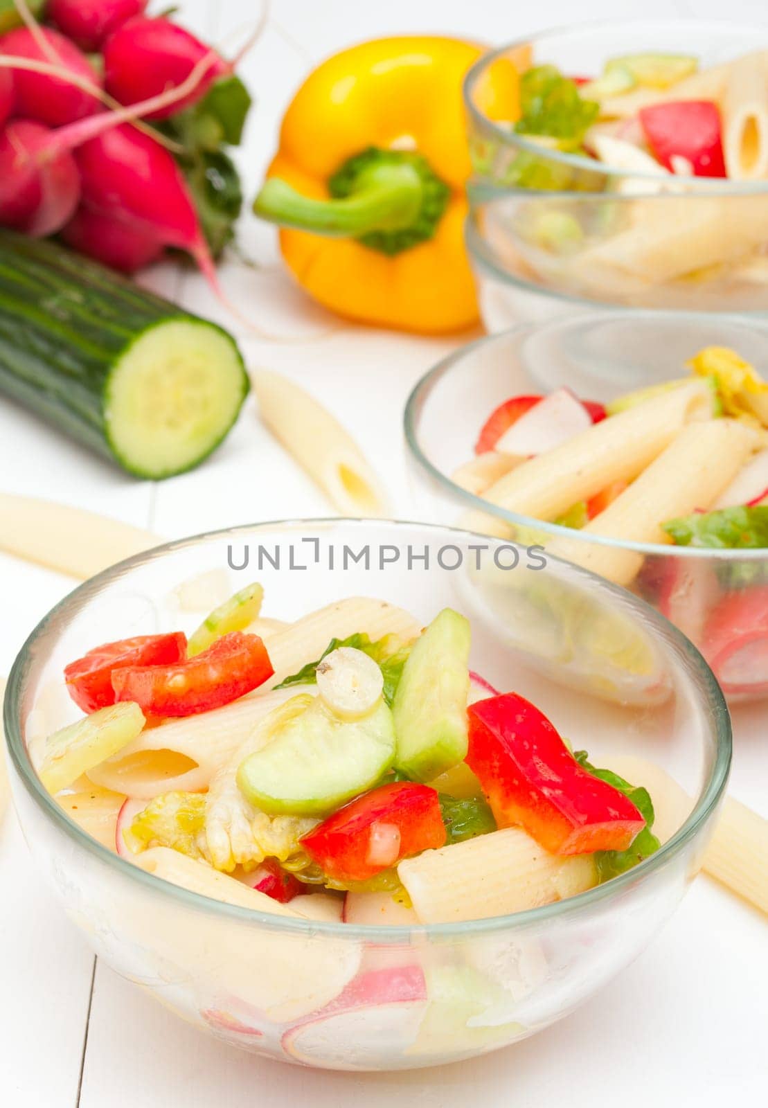 Fresh Pasta Salad With Tomatoes, Pepper, Cucumber, Radish and Lettuce