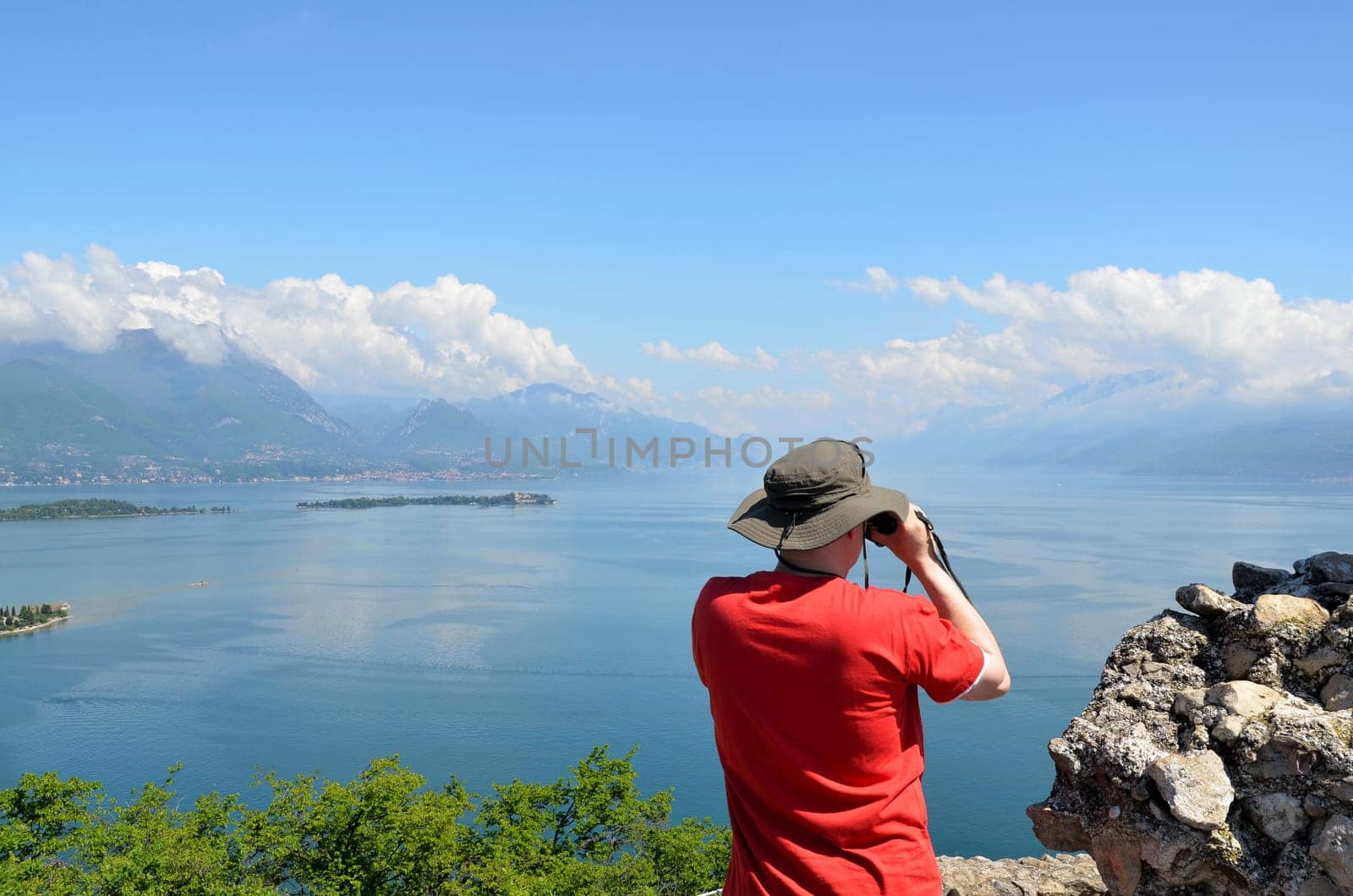 Man looking through binoculars