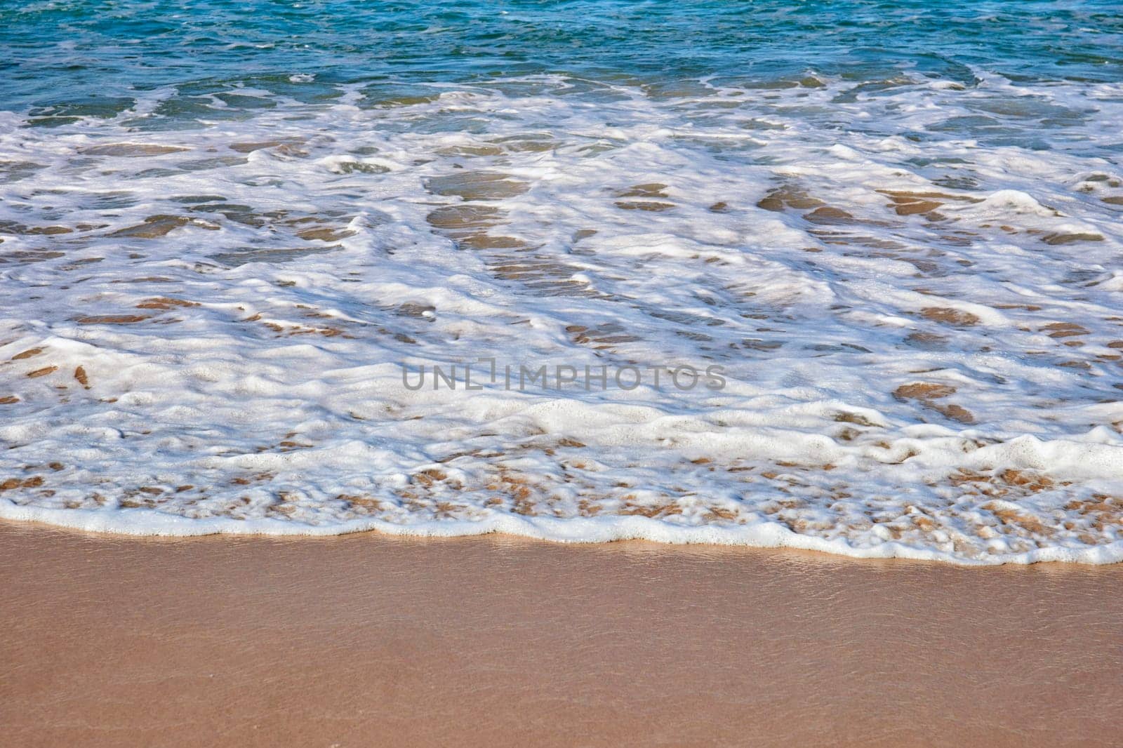 perfect soft waves on the sand at bondi beach