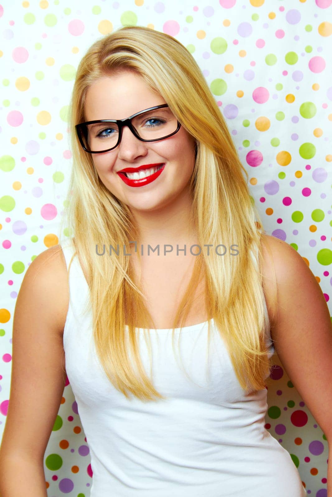 Funny woman with glasses laughing