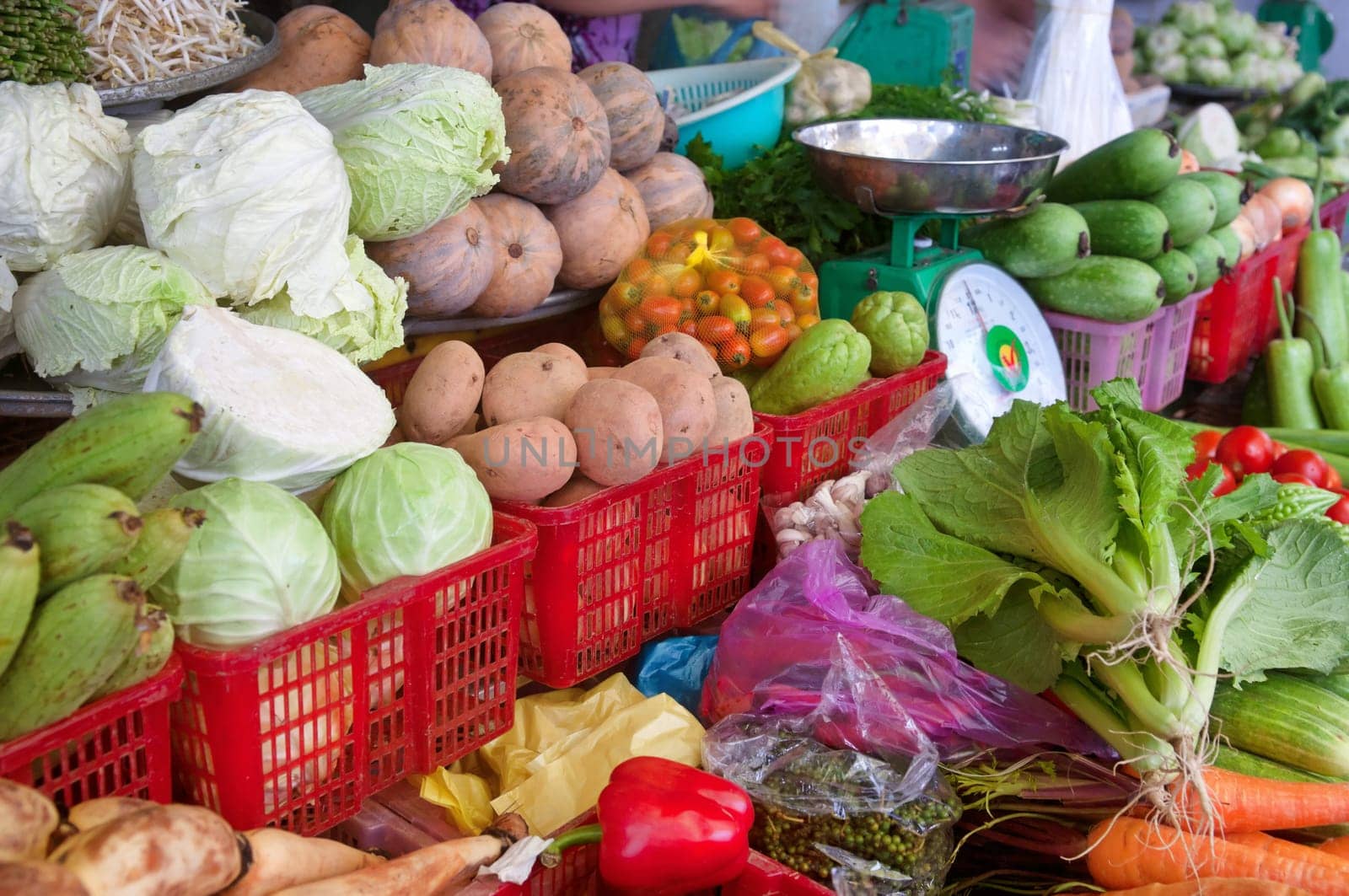 fresh fruit and vegetables for sale in this market stall