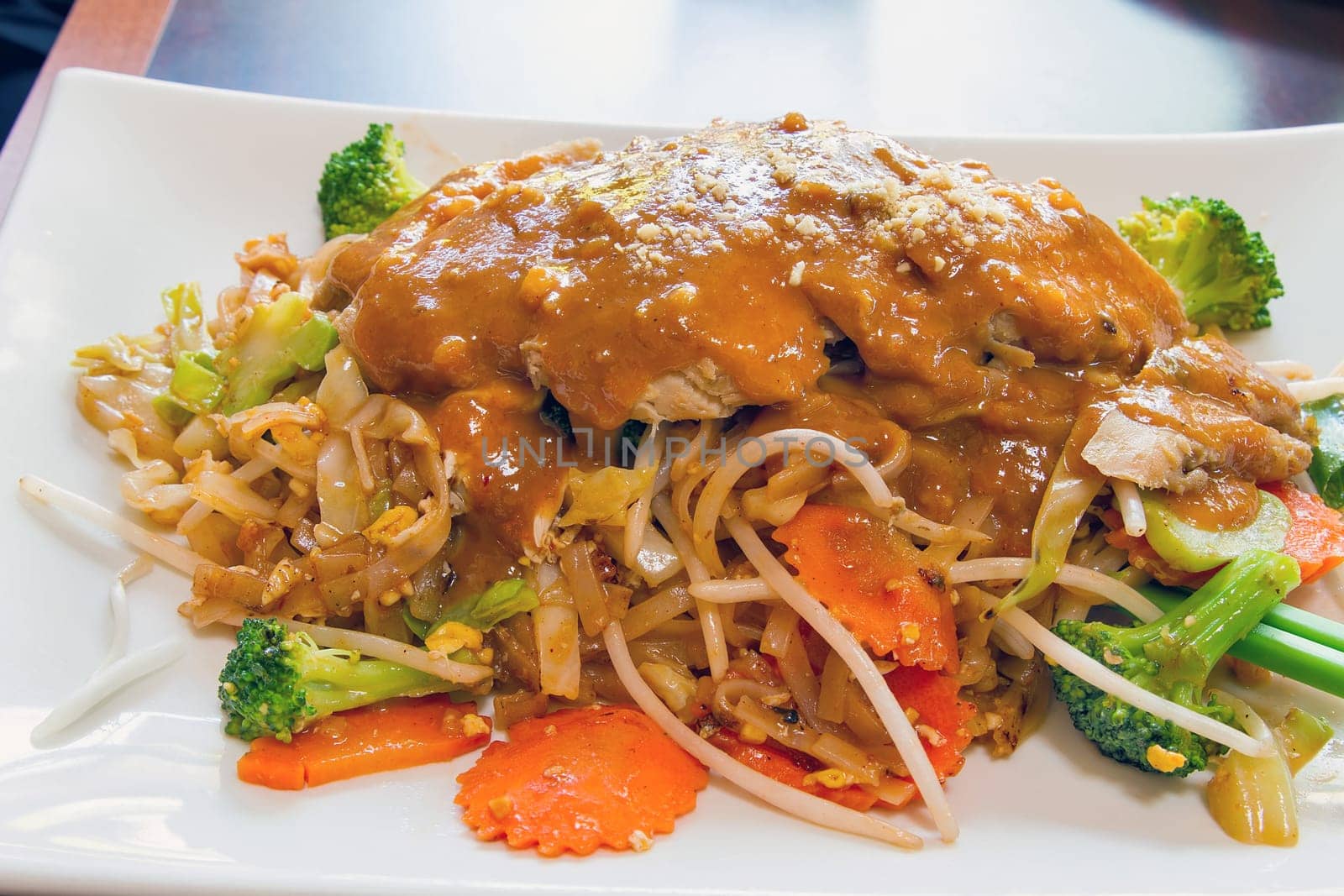 Pad Thai Noodles with Lemongrass Grilled Chicken and Peanut Sauce Dish